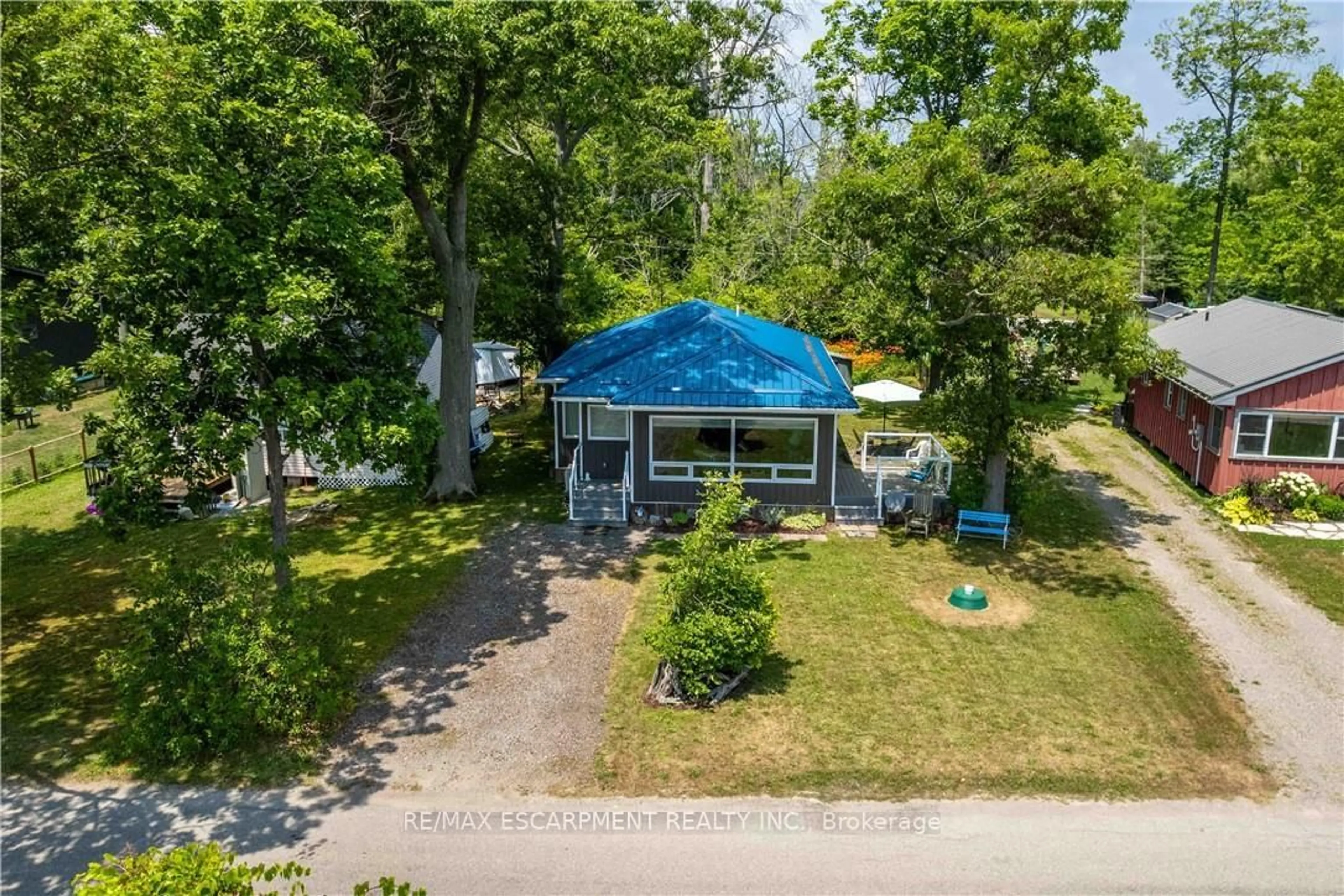 A pic from outside/outdoor area/front of a property/back of a property/a pic from drone, water/lake/river/ocean view for 2399 Lakeshore Rd, Haldimand Ontario N1A 2W8