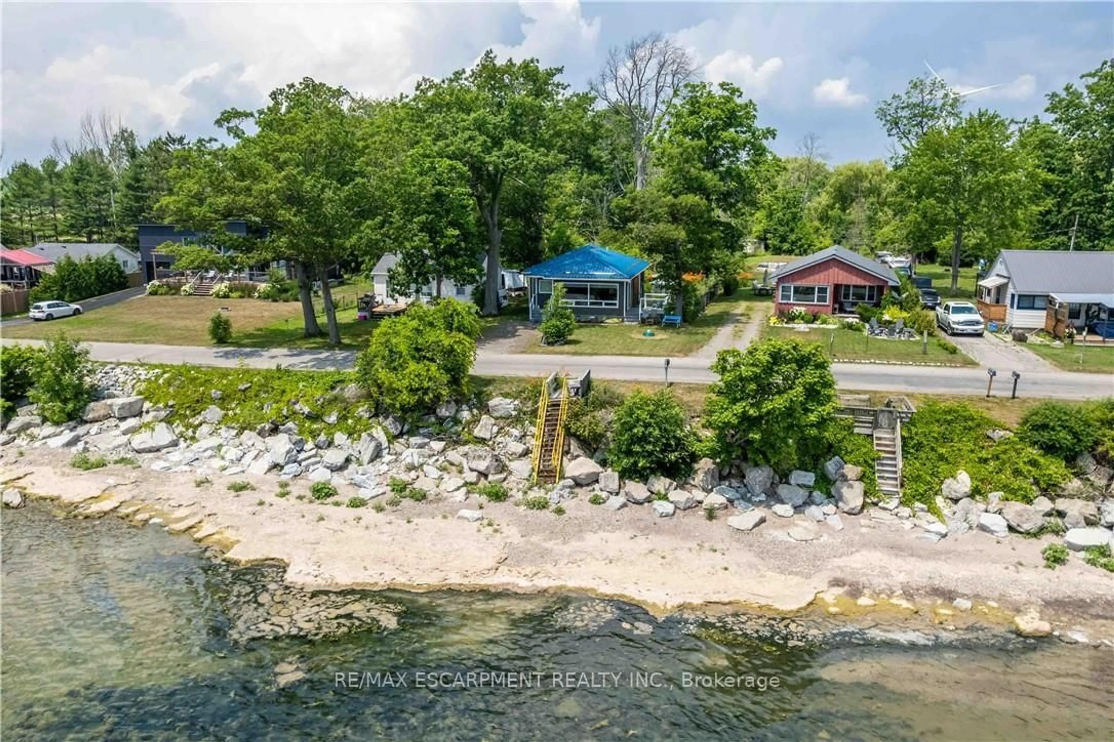 A pic from outside/outdoor area/front of a property/back of a property/a pic from drone, water/lake/river/ocean view for 2399 Lakeshore Rd, Haldimand Ontario N1A 2W8