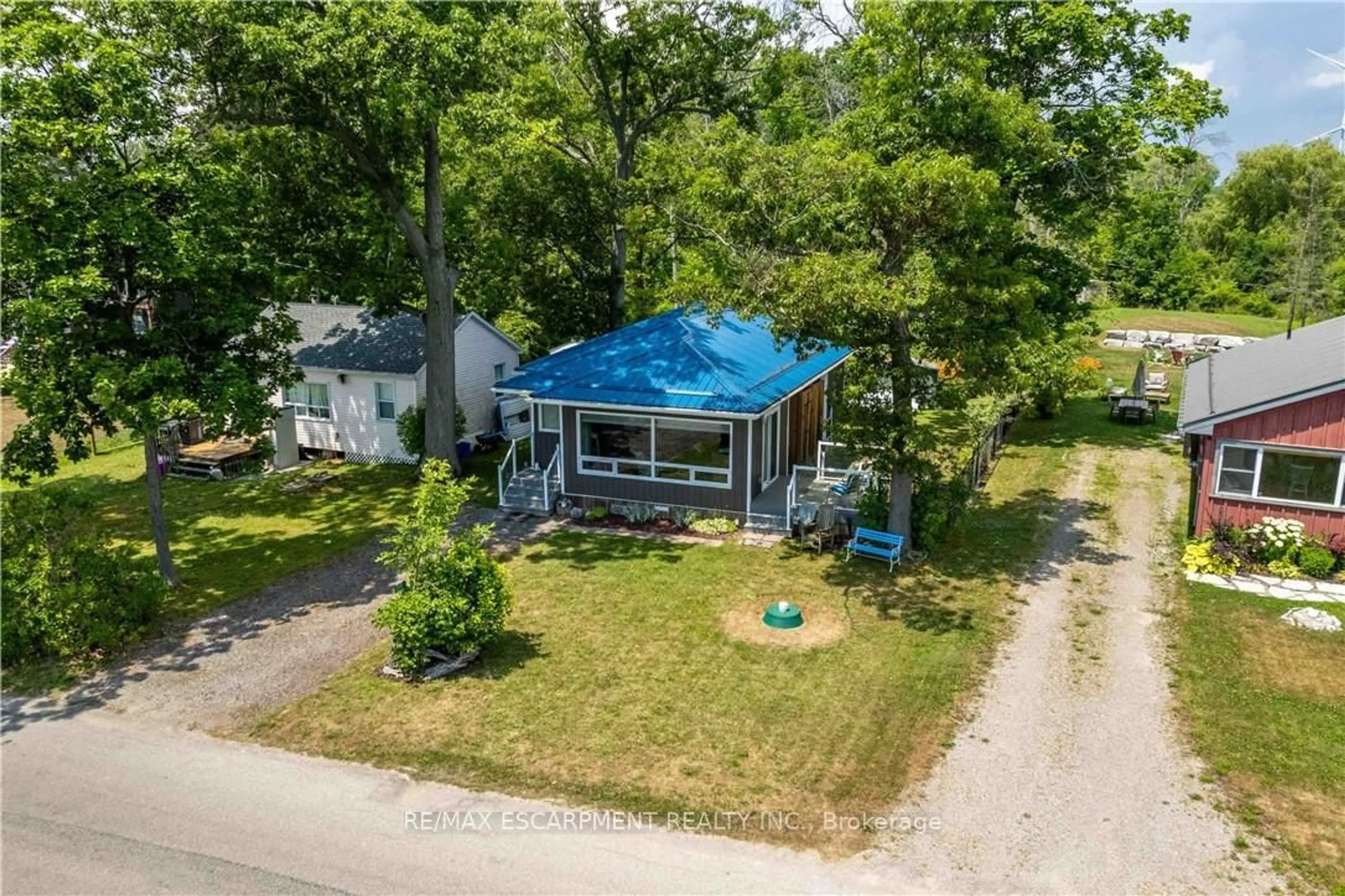 A pic from outside/outdoor area/front of a property/back of a property/a pic from drone, street for 2399 Lakeshore Rd, Haldimand Ontario N1A 2W8