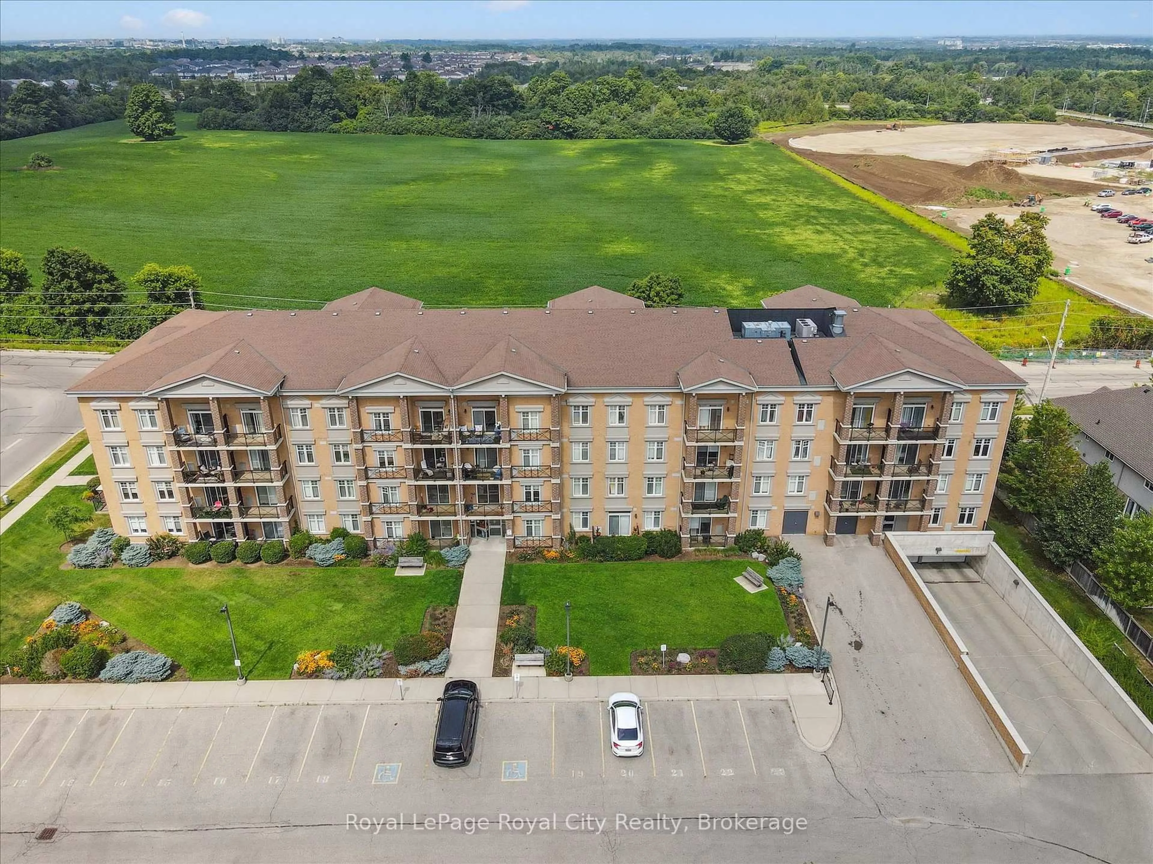 A pic from outside/outdoor area/front of a property/back of a property/a pic from drone, building for 2 Colonial Dr #403, Guelph Ontario N1L 0K8