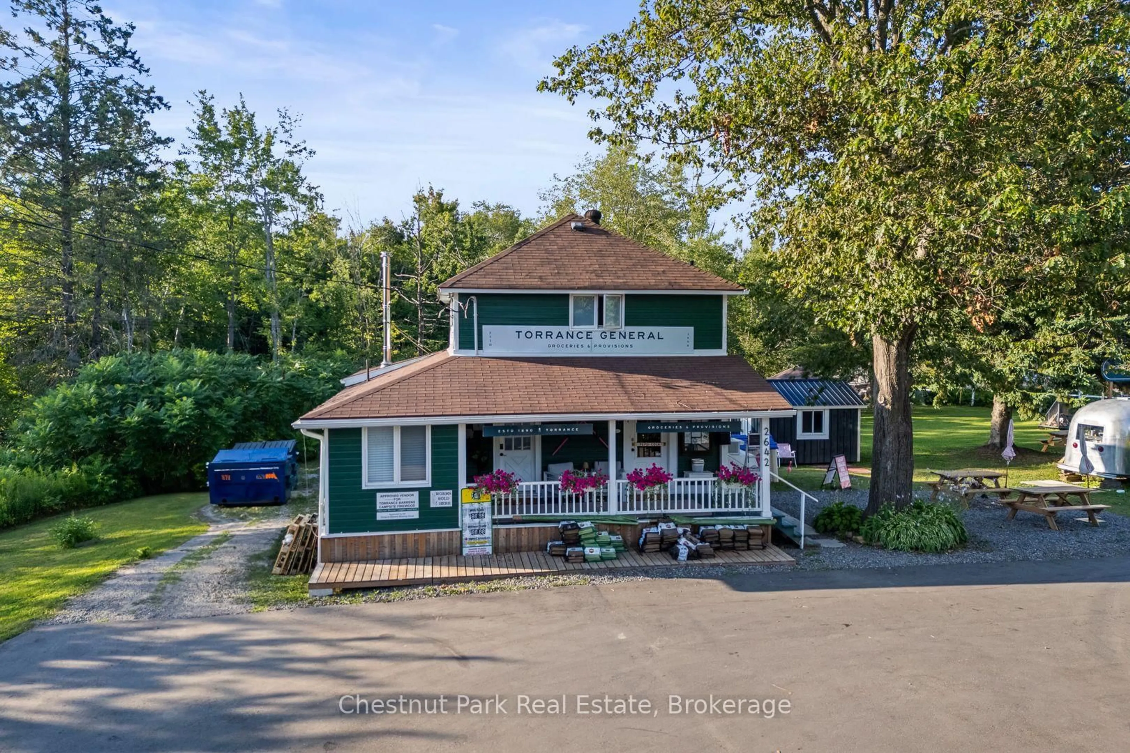A pic from outside/outdoor area/front of a property/back of a property/a pic from drone, street for 2642 Muskoka 169 Rd, Muskoka Lakes Ontario P0C 1M0