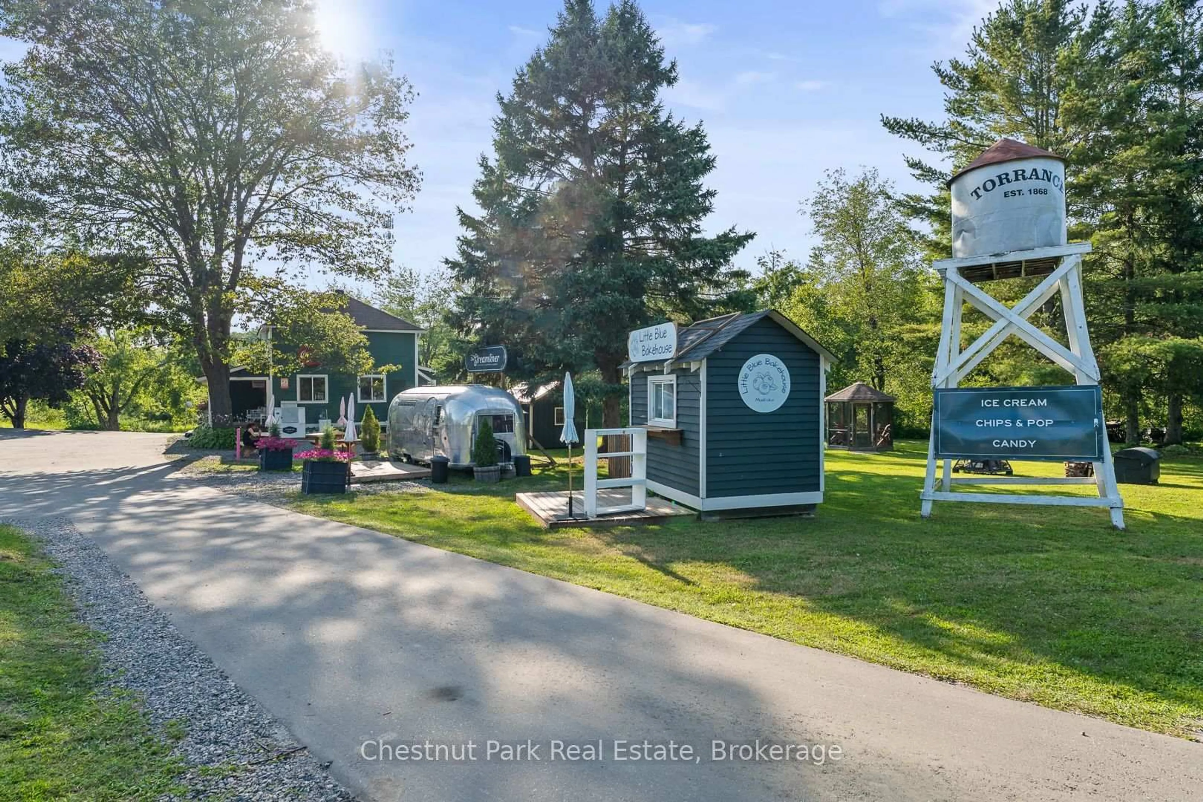 A pic from outside/outdoor area/front of a property/back of a property/a pic from drone, street for 2642 Muskoka 169 Rd, Muskoka Lakes Ontario P0C 1M0