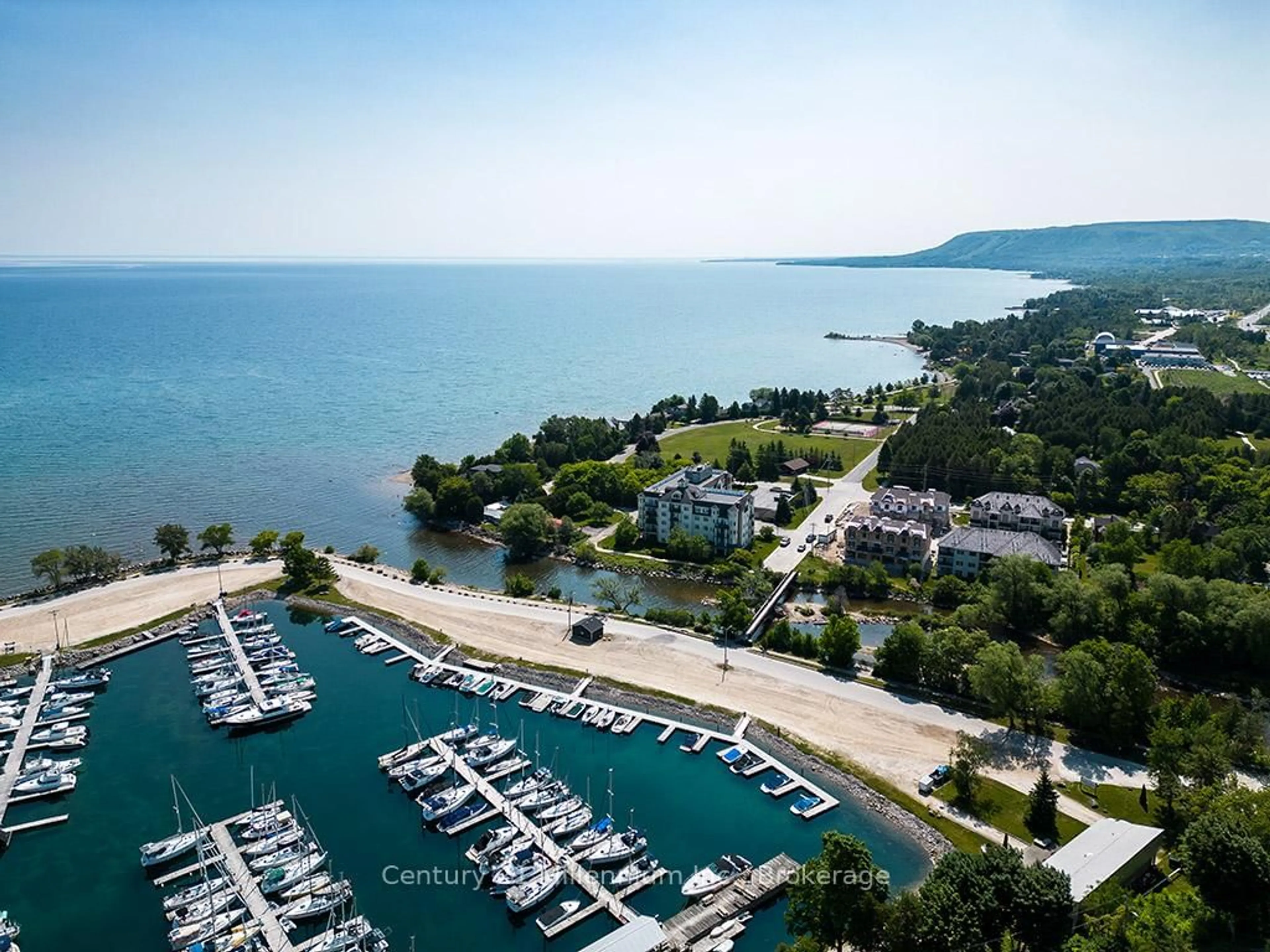 A pic from outside/outdoor area/front of a property/back of a property/a pic from drone, water/lake/river/ocean view for 10 Bay St #407, Blue Mountains Ontario N0H 2P0