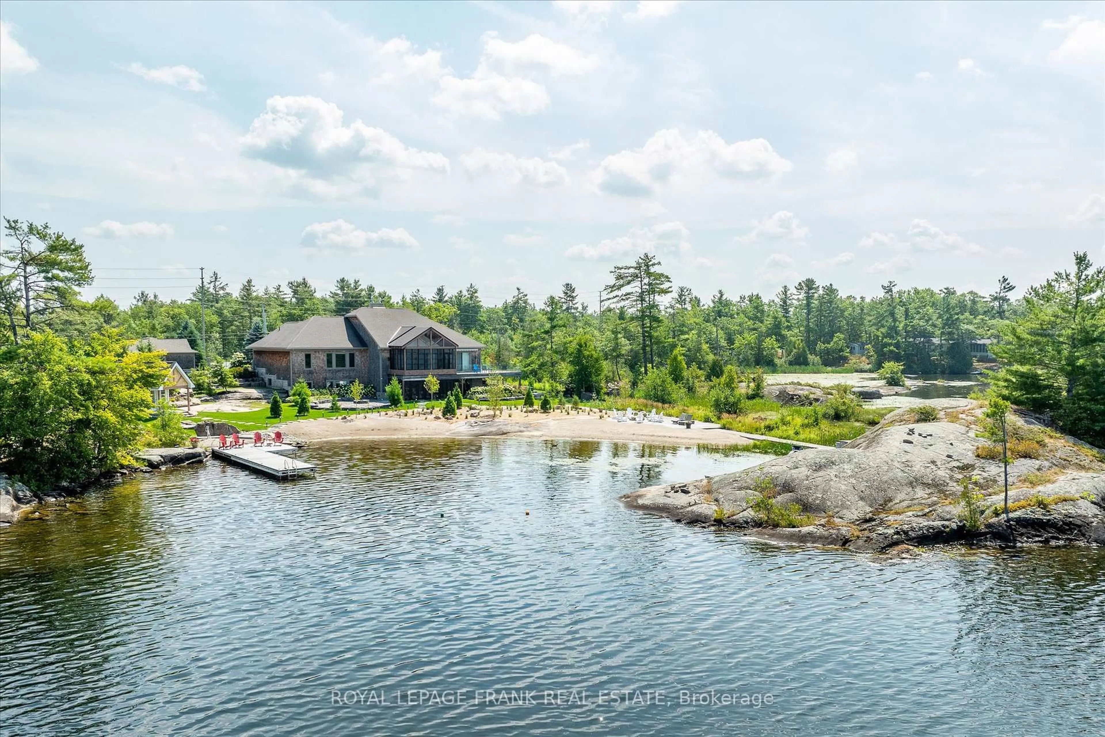 A pic from outside/outdoor area/front of a property/back of a property/a pic from drone, water/lake/river/ocean view for 3790 County Road 6, North Kawartha Ontario K0L 3E0