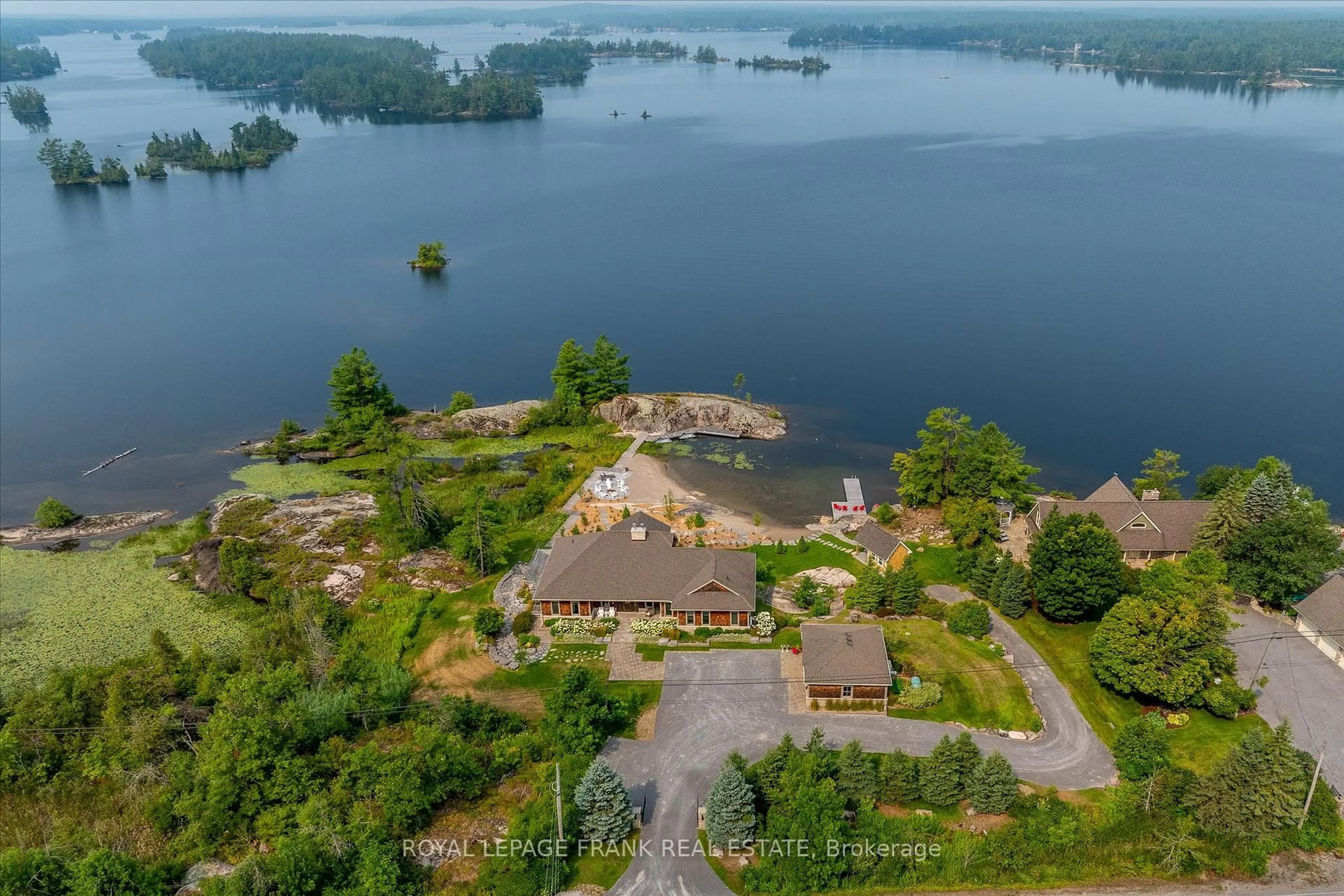 A pic from outside/outdoor area/front of a property/back of a property/a pic from drone, water/lake/river/ocean view for 3790 County Road 6, North Kawartha Ontario K0L 3E0
