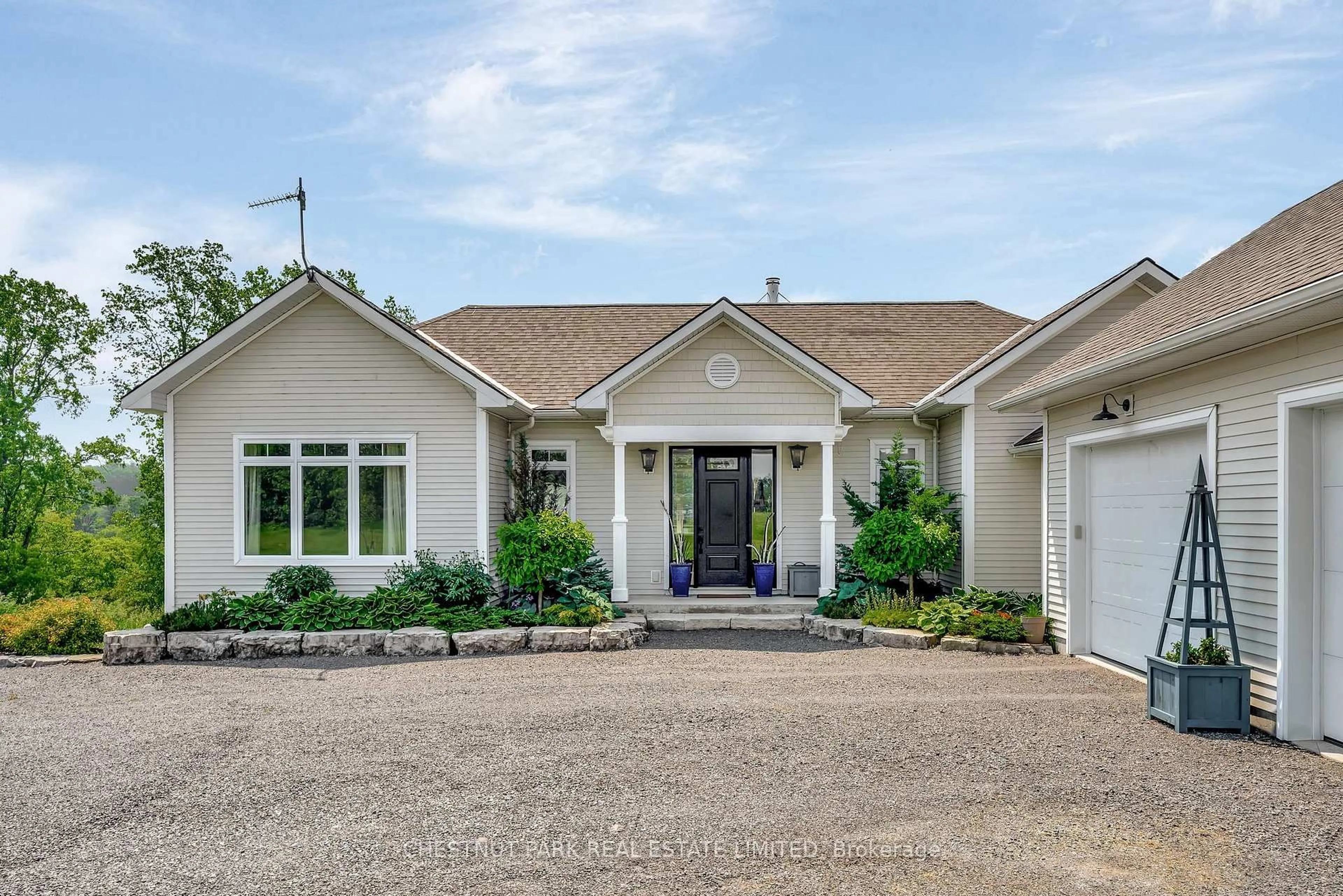 Home with vinyl exterior material, street for 3118 County Road 10 Rd, Prince Edward County Ontario K0K 2P0