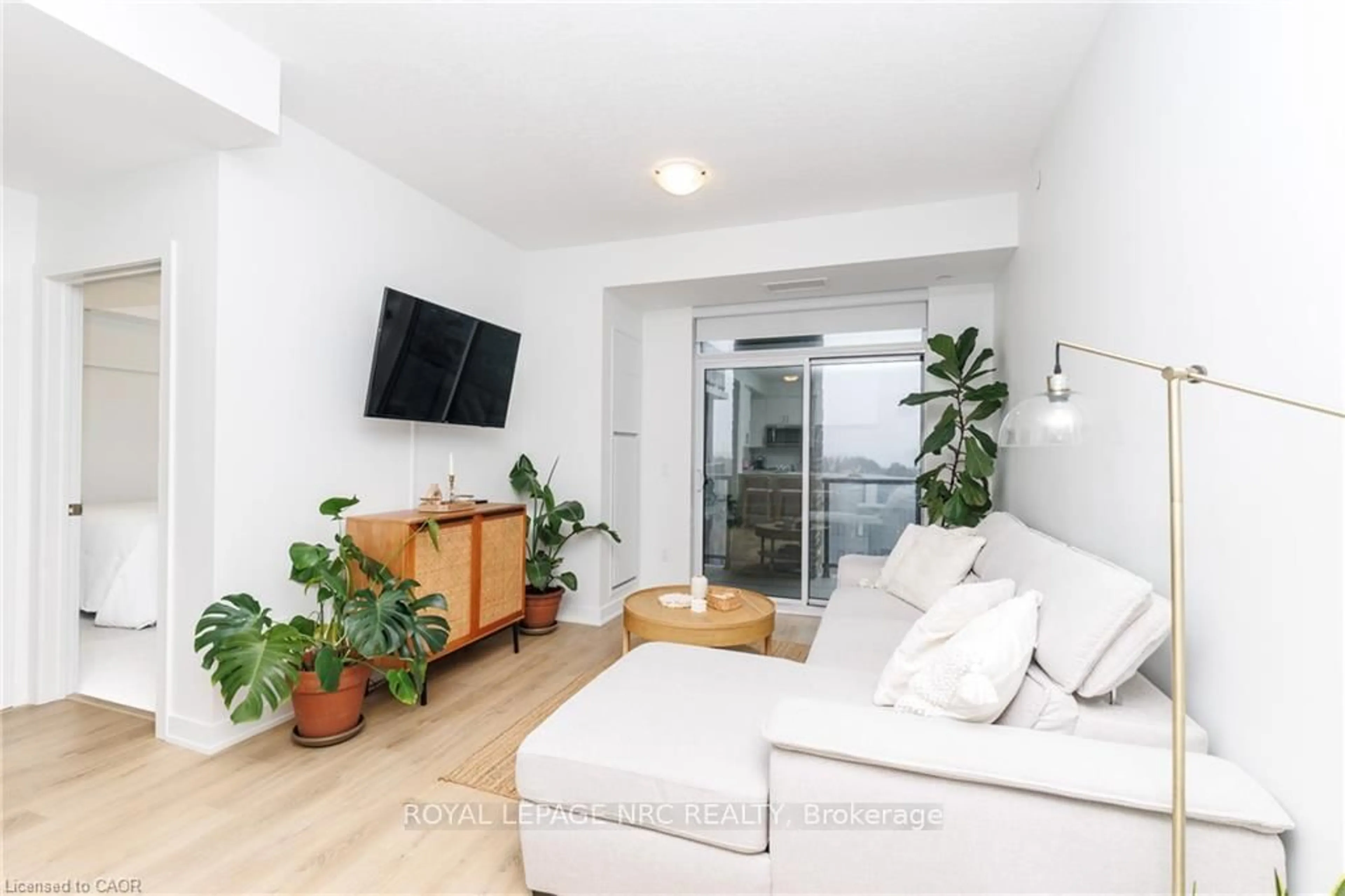 Living room with furniture, unknown for 600 North Service Rd #501, Hamilton Ontario L8E 5A7