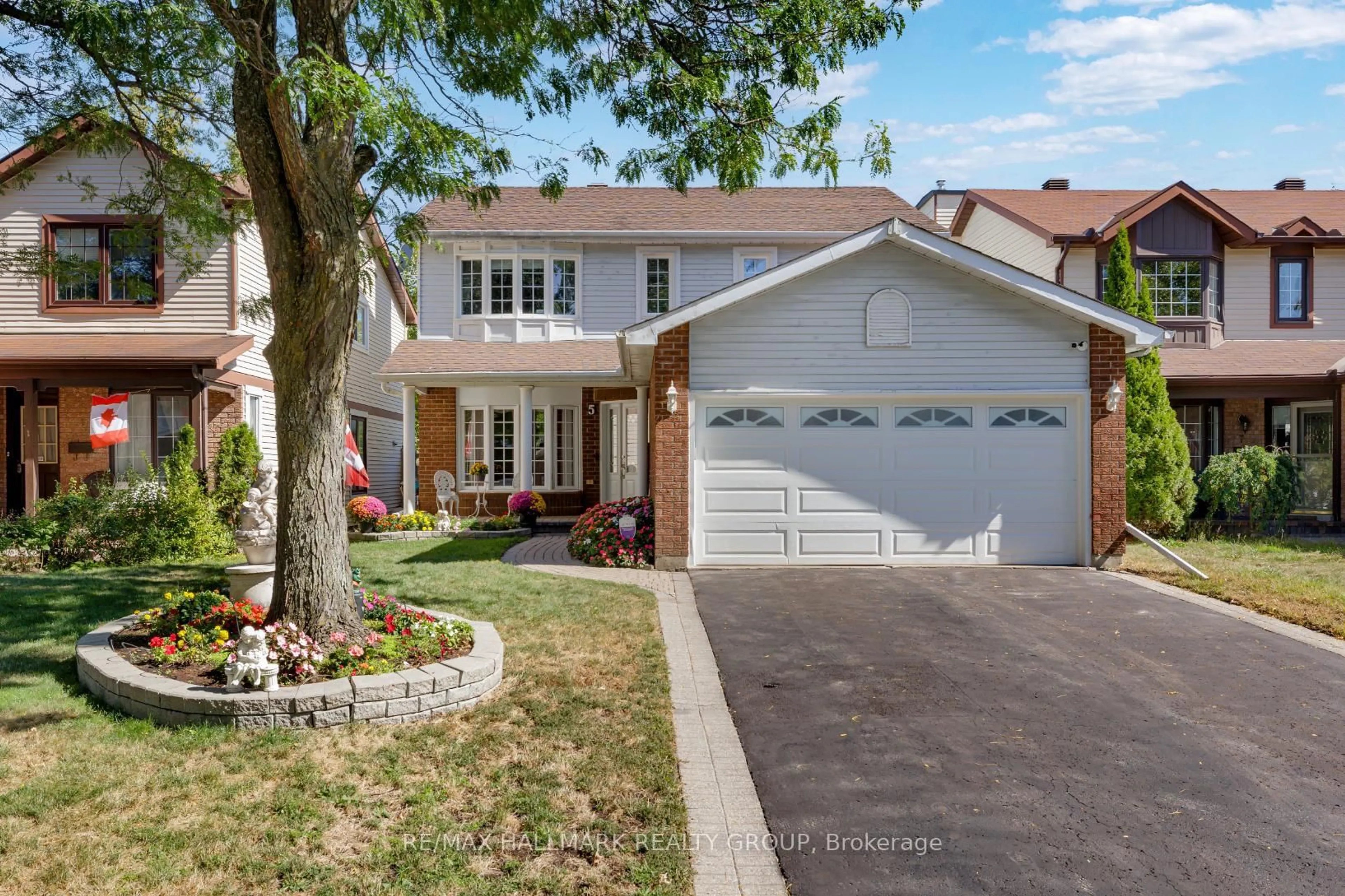 Home with brick exterior material, street for 5 Ellisson Way, Ottawa Ontario K1G 4N9