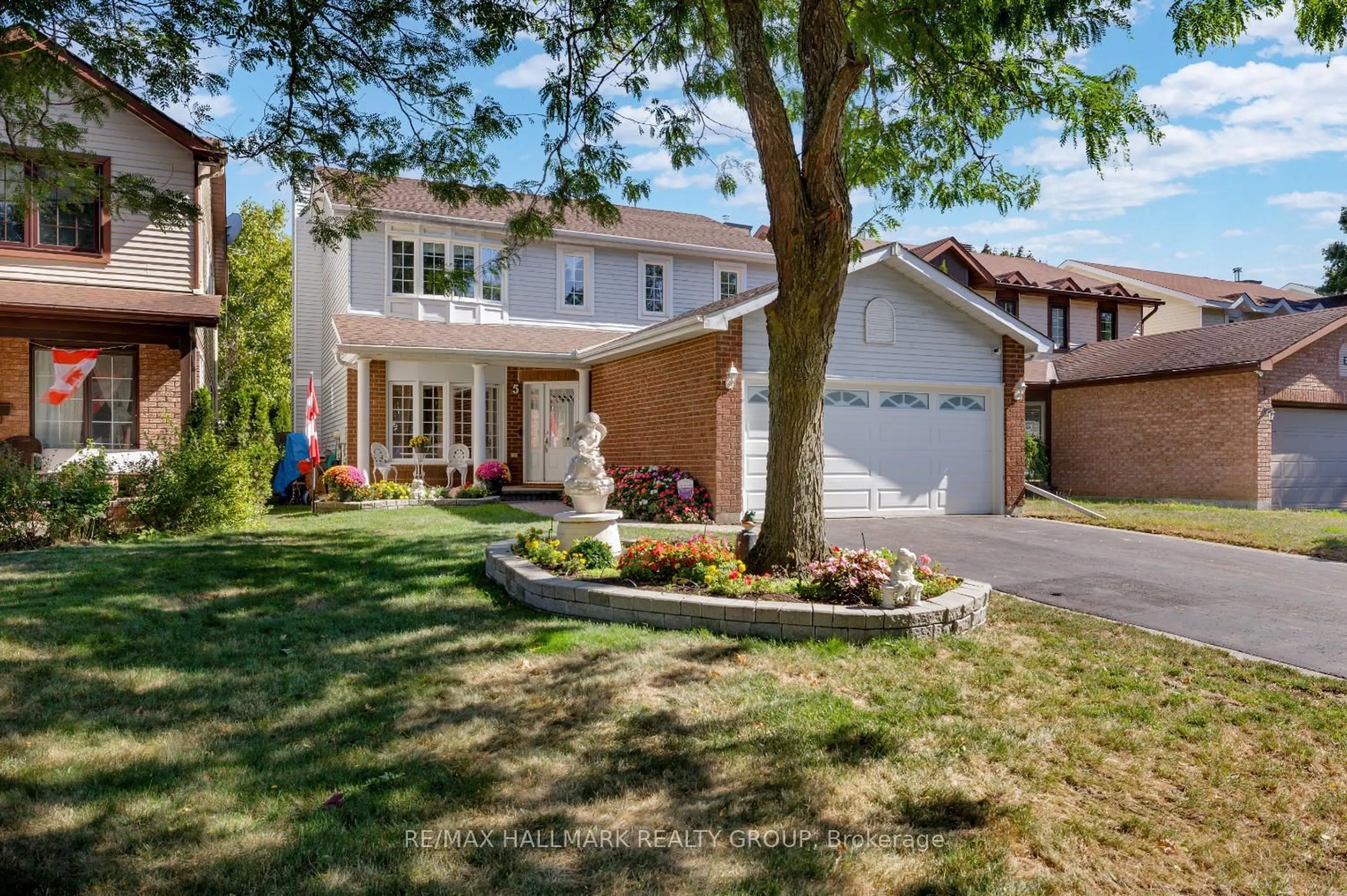 Home with brick exterior material, street for 5 Ellisson Way, Ottawa Ontario K1G 4N9