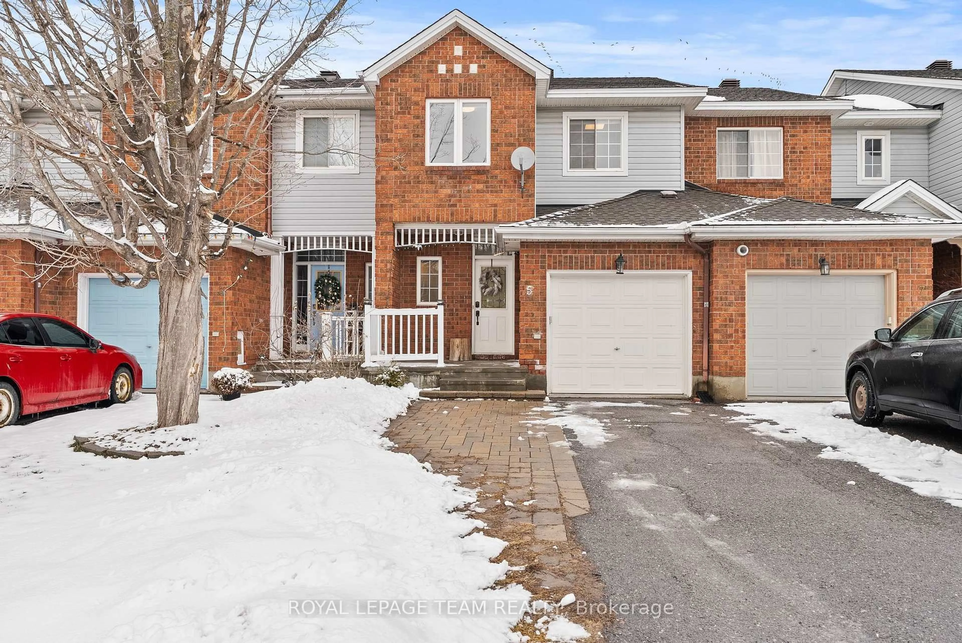 Home with brick exterior material, street for 5 Milner Downs Cres, Ottawa Ontario K2M 2S6