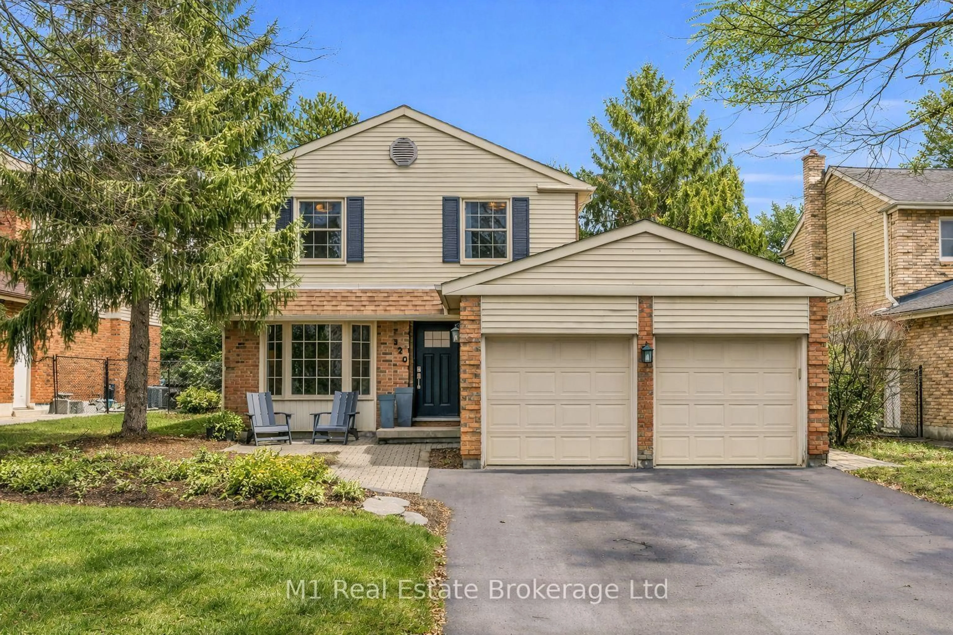 Home with vinyl exterior material, street for 320 Tatlock Dr, Waterloo Ontario N2L 5Y5