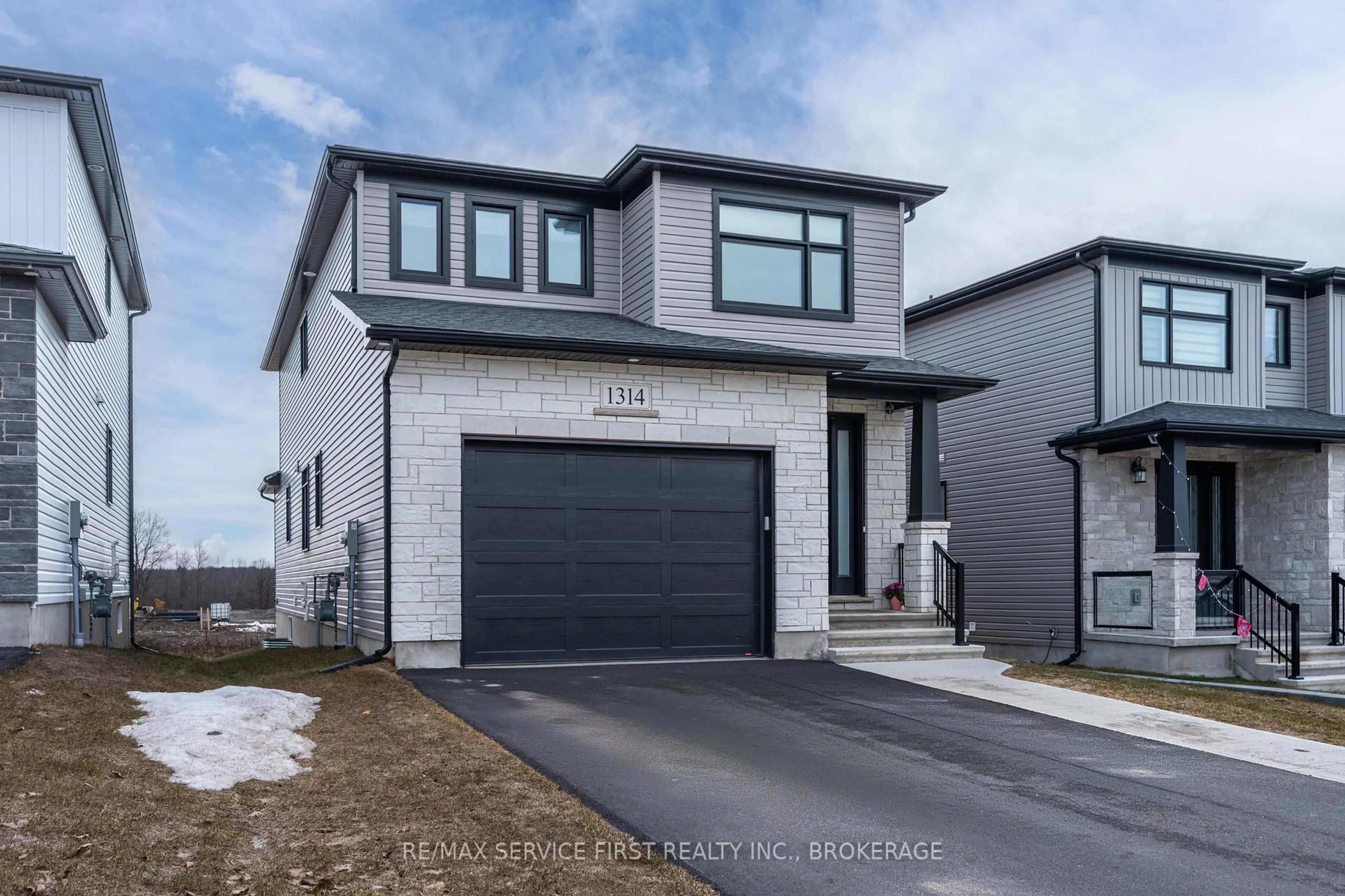 Home with brick exterior material, street for 1314 Turnbull Way, Kingston Ontario K7P 0T3