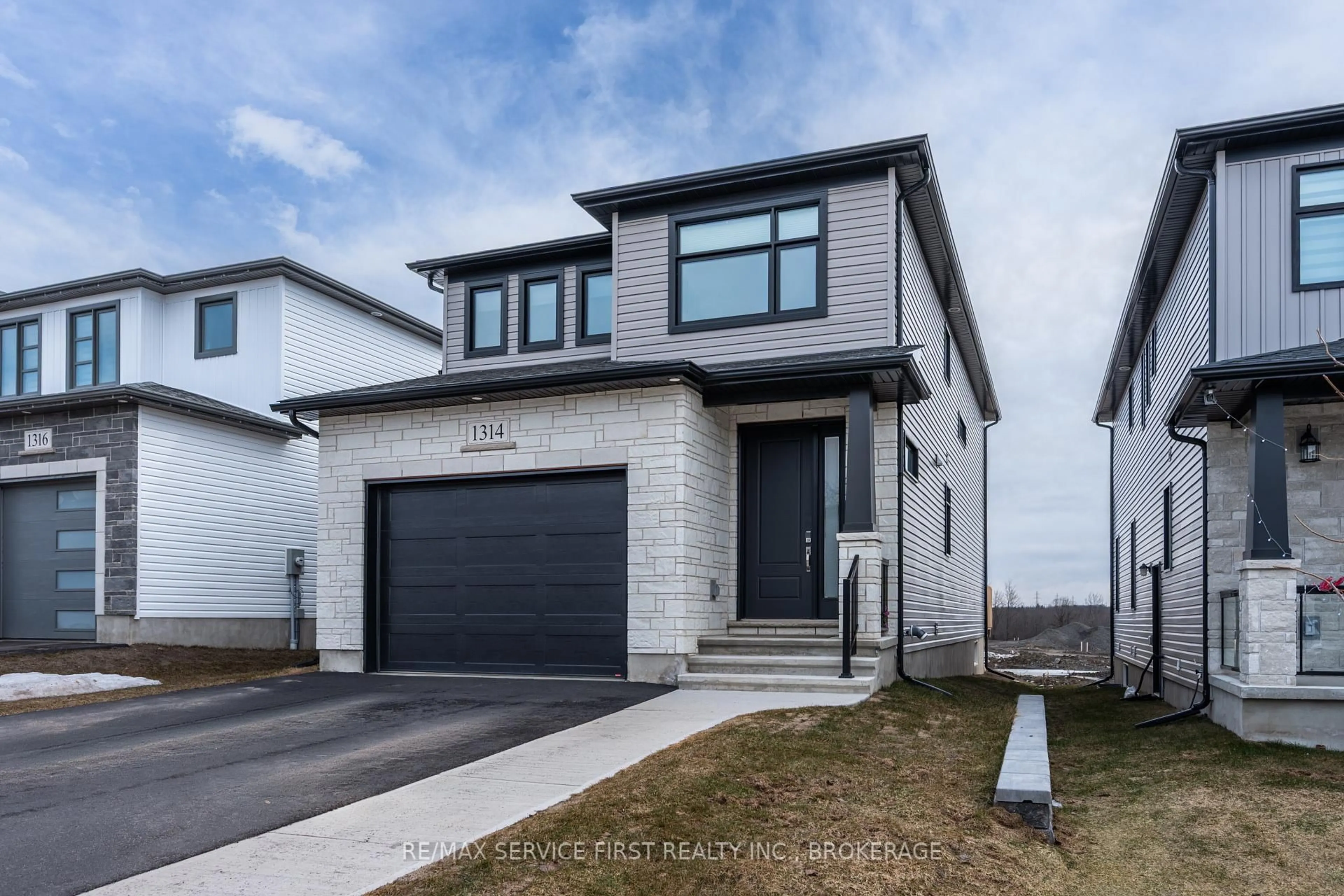 Home with brick exterior material, street for 1314 Turnbull Way, Kingston Ontario K7P 0T3