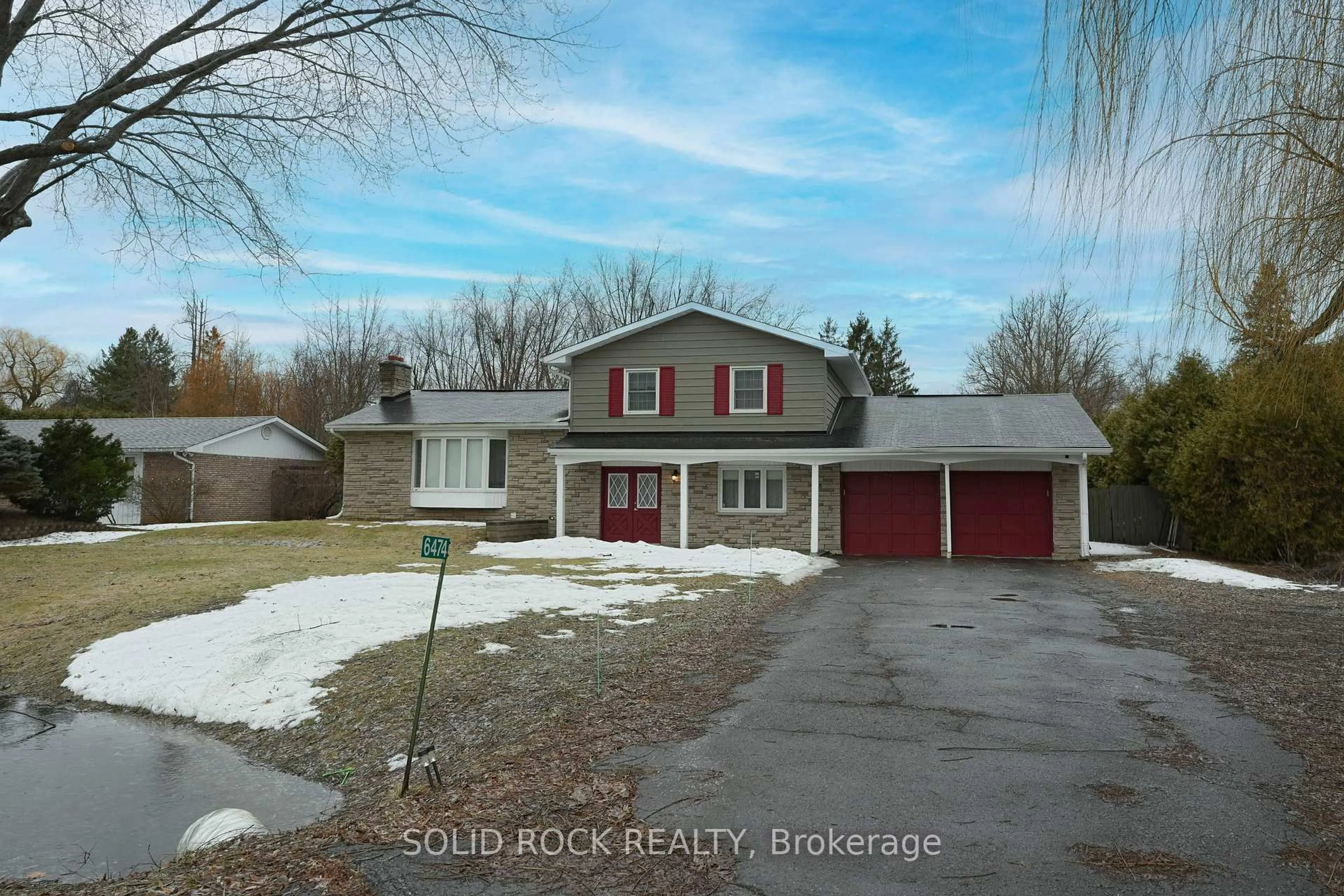 A pic from outside/outdoor area/front of a property/back of a property/a pic from drone, street for 6474 Bunker Rd, Manotick Ontario K4M 1B3