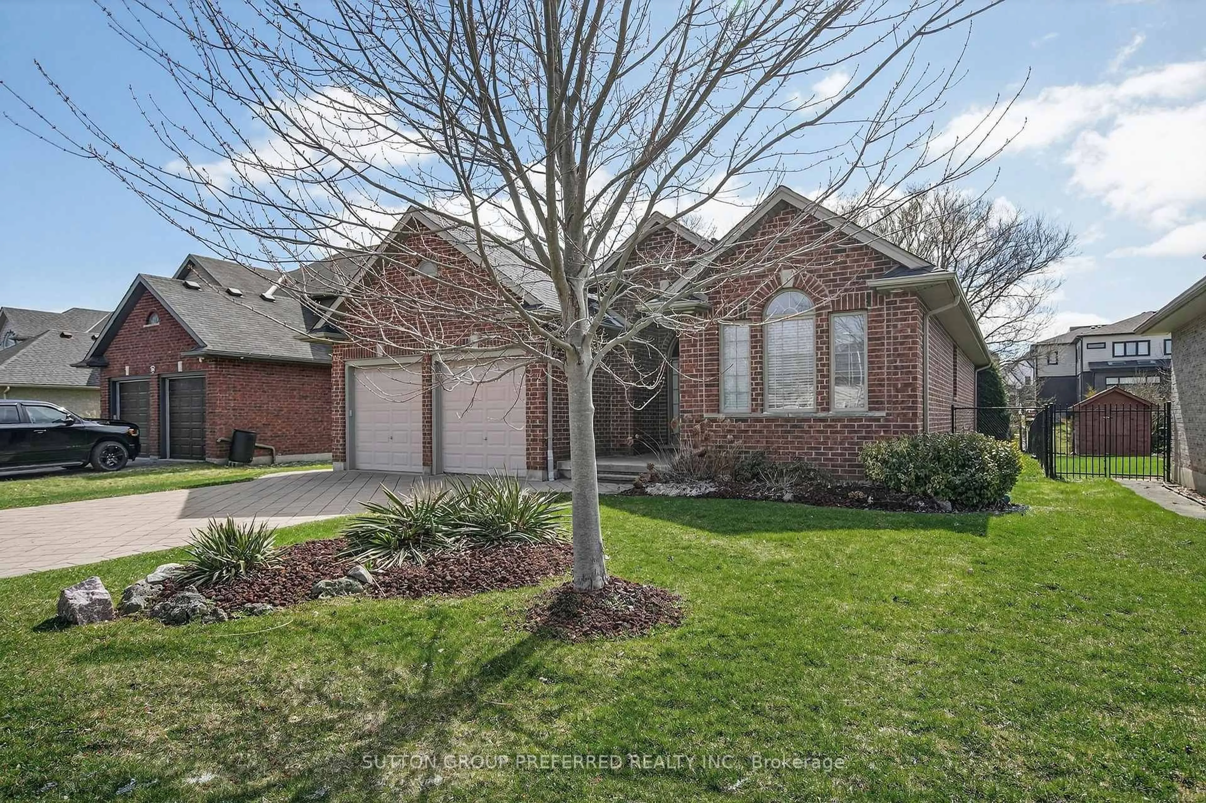 Home with brick exterior material, street for 22 Springfield Way, Middlesex Centre Ontario N0L 1R0