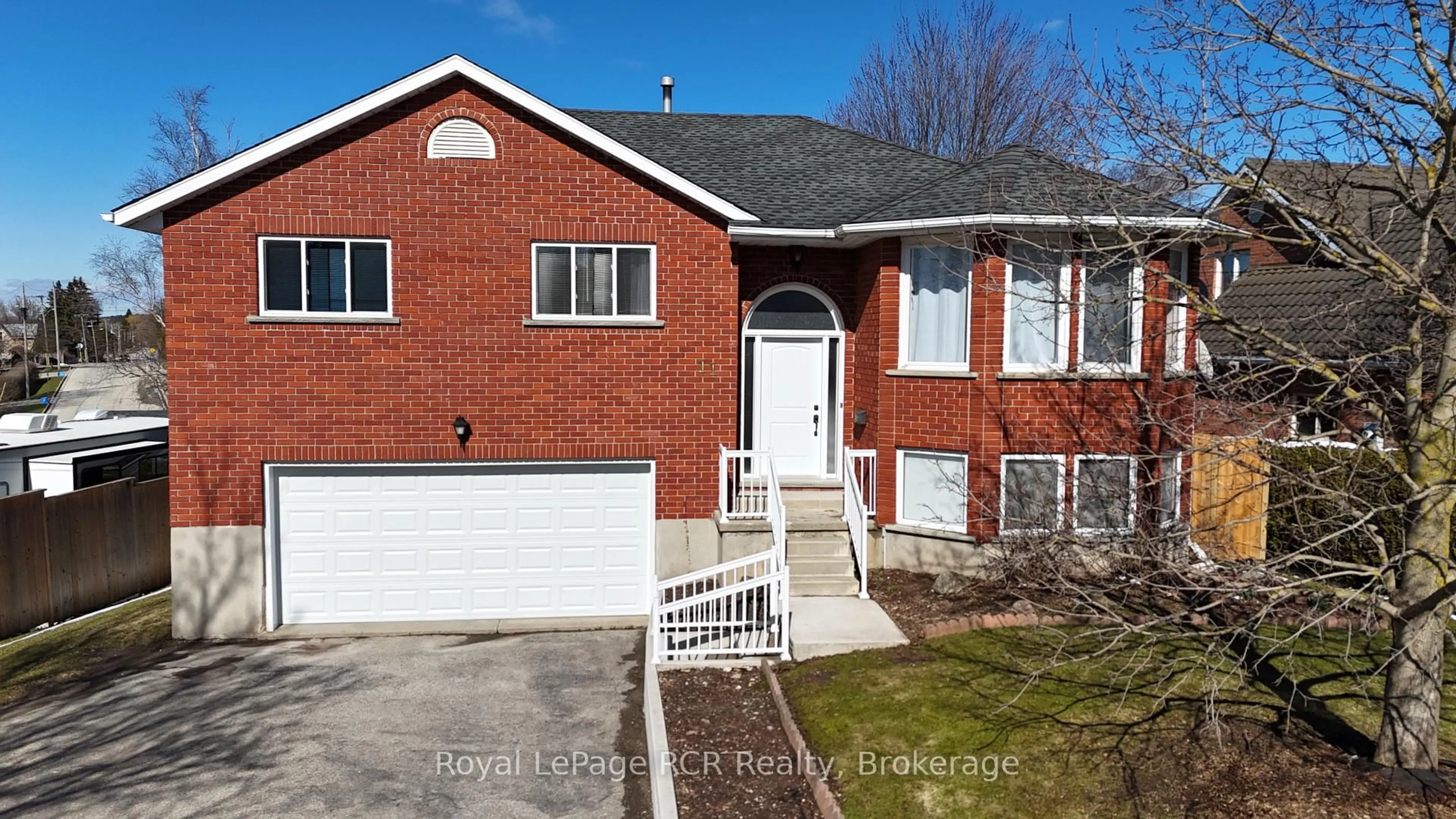Home with brick exterior material, street for 11 Bonniewood Dr, Mapleton Ontario N0G 1P0