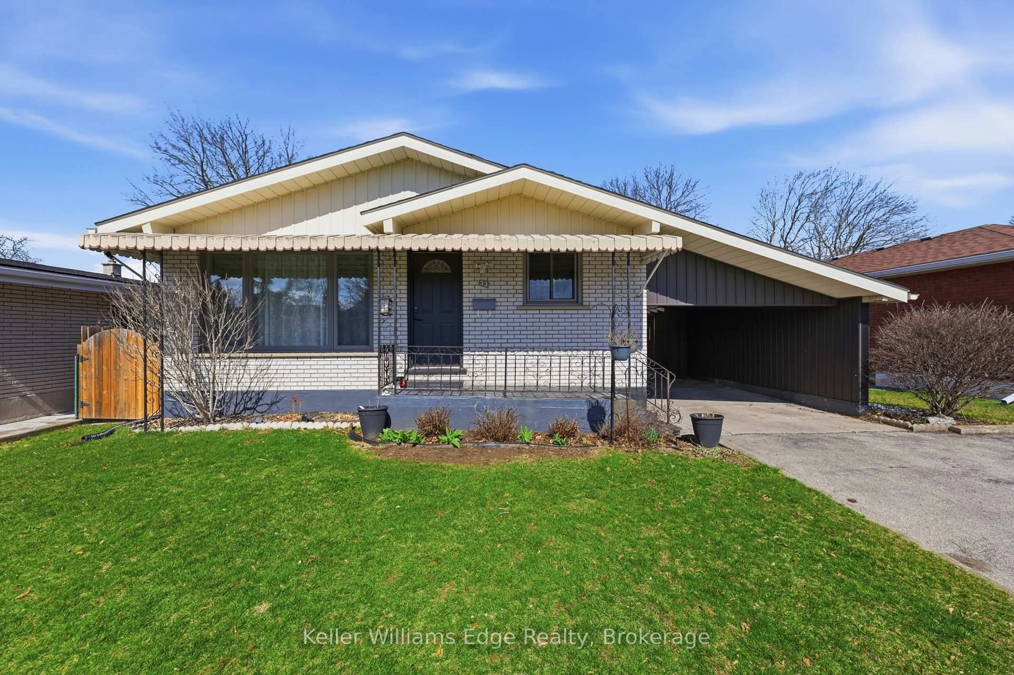 Home with brick exterior material, street for 33 Buckingham St, Brantford Ontario N3R 3A9