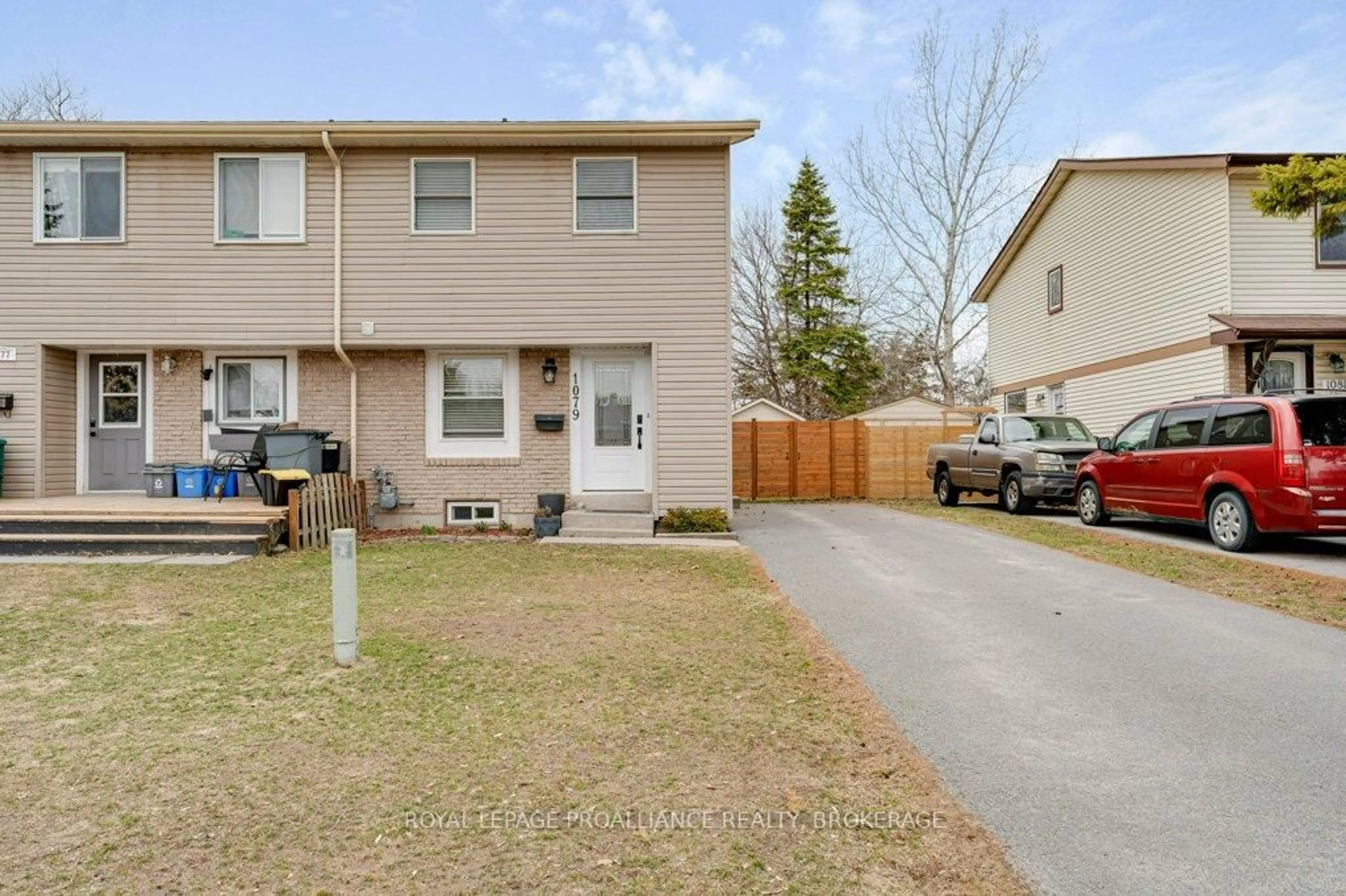 A pic from outside/outdoor area/front of a property/back of a property/a pic from drone, street for 1079 Basswood Pl, Kingston Ontario K7P 1K4