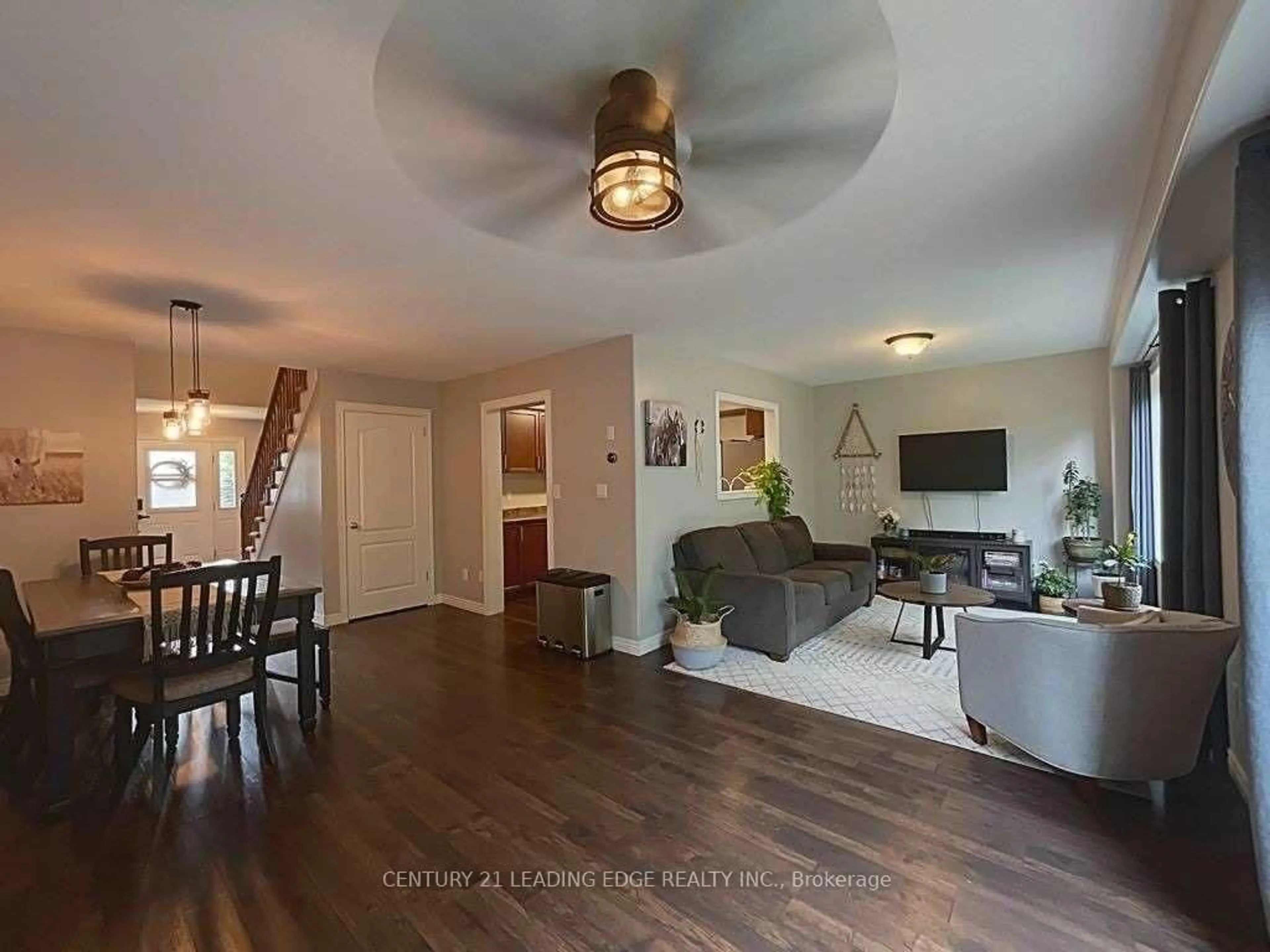 Living room with furniture, wood/laminate floor for 124 College St #9, West Lincoln Ontario L0R 2A0