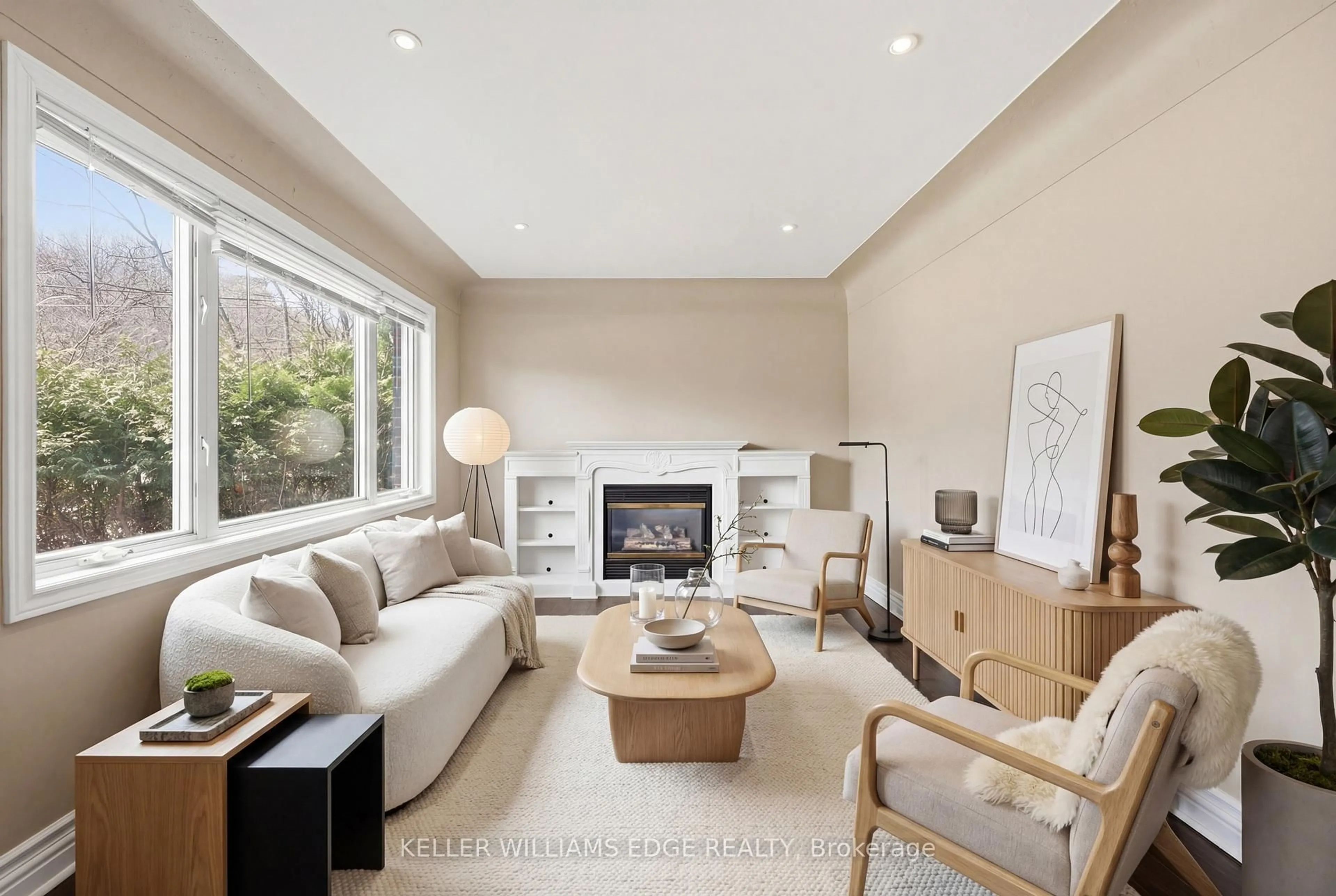 Living room with furniture, wood/laminate floor for 48 Mountain Ave, Hamilton Ontario L8G 2V8