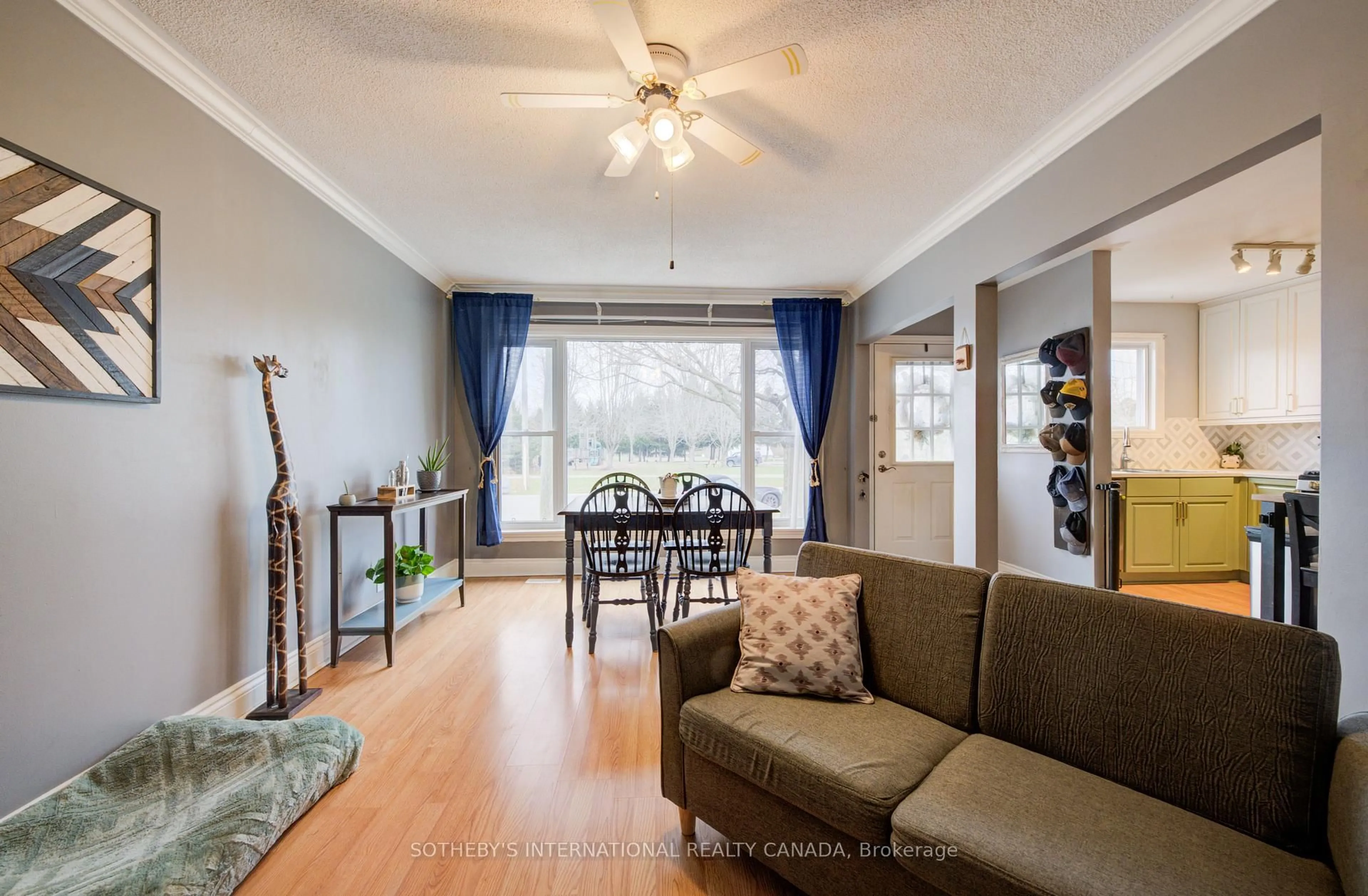 Living room with furniture, wood/laminate floor for 425 St. Patrick St, Norfolk Ontario N0A 1N0