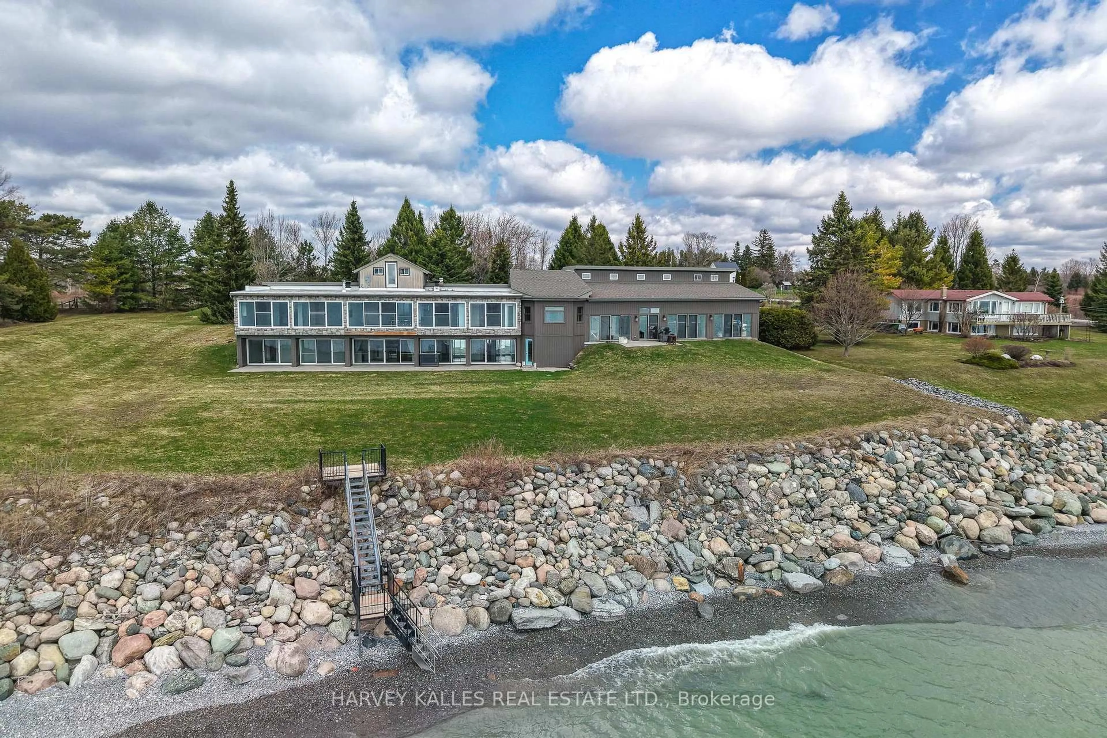 A pic from outside/outdoor area/front of a property/back of a property/a pic from drone, water/lake/river/ocean view for 431 Victoria Beach Rd, Cramahe Ontario K0K 1S0