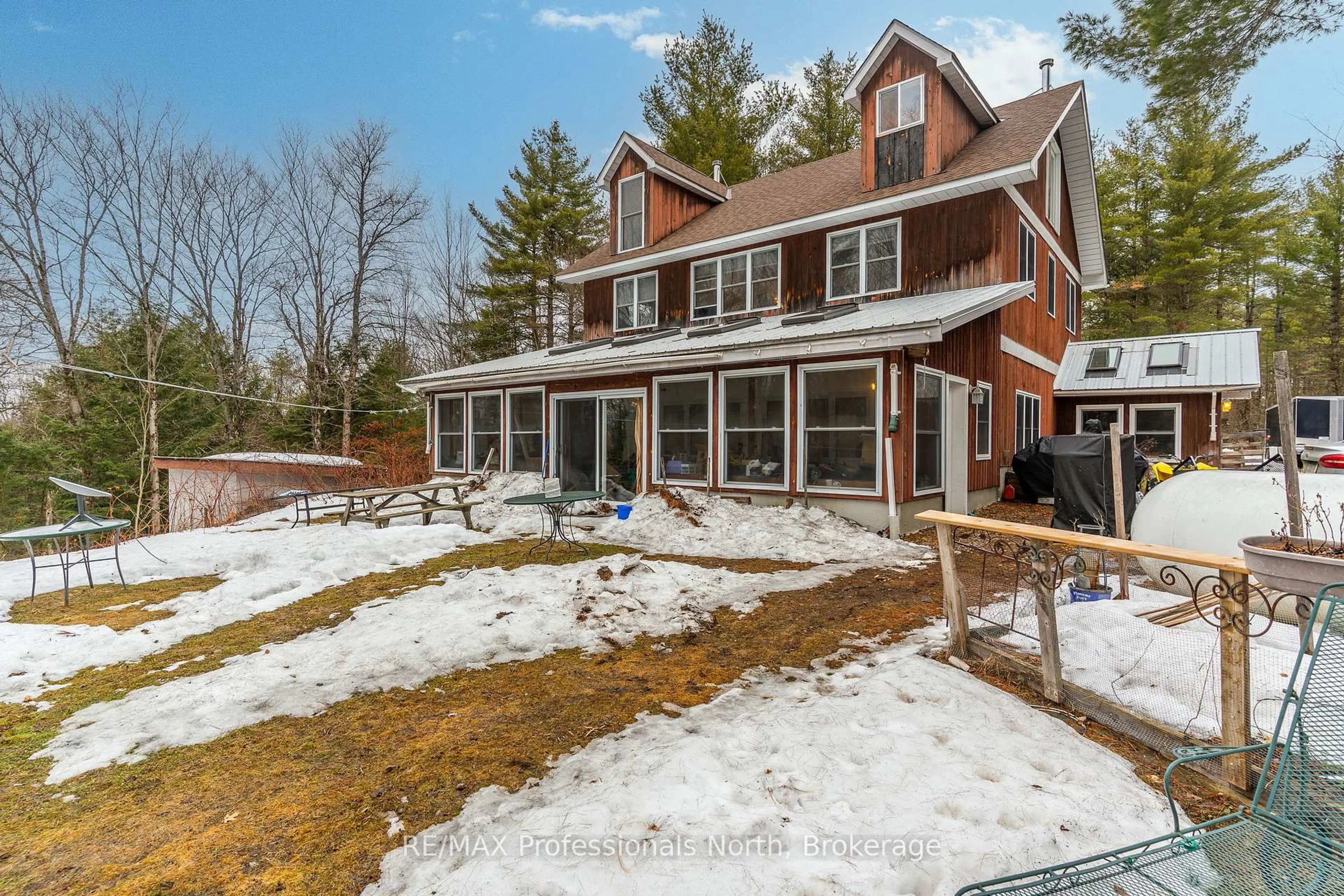 A pic from outside/outdoor area/front of a property/back of a property/a pic from drone, street for 1127 Bobcaygeon Rd, Minden Hills Ontario K0M 2K0