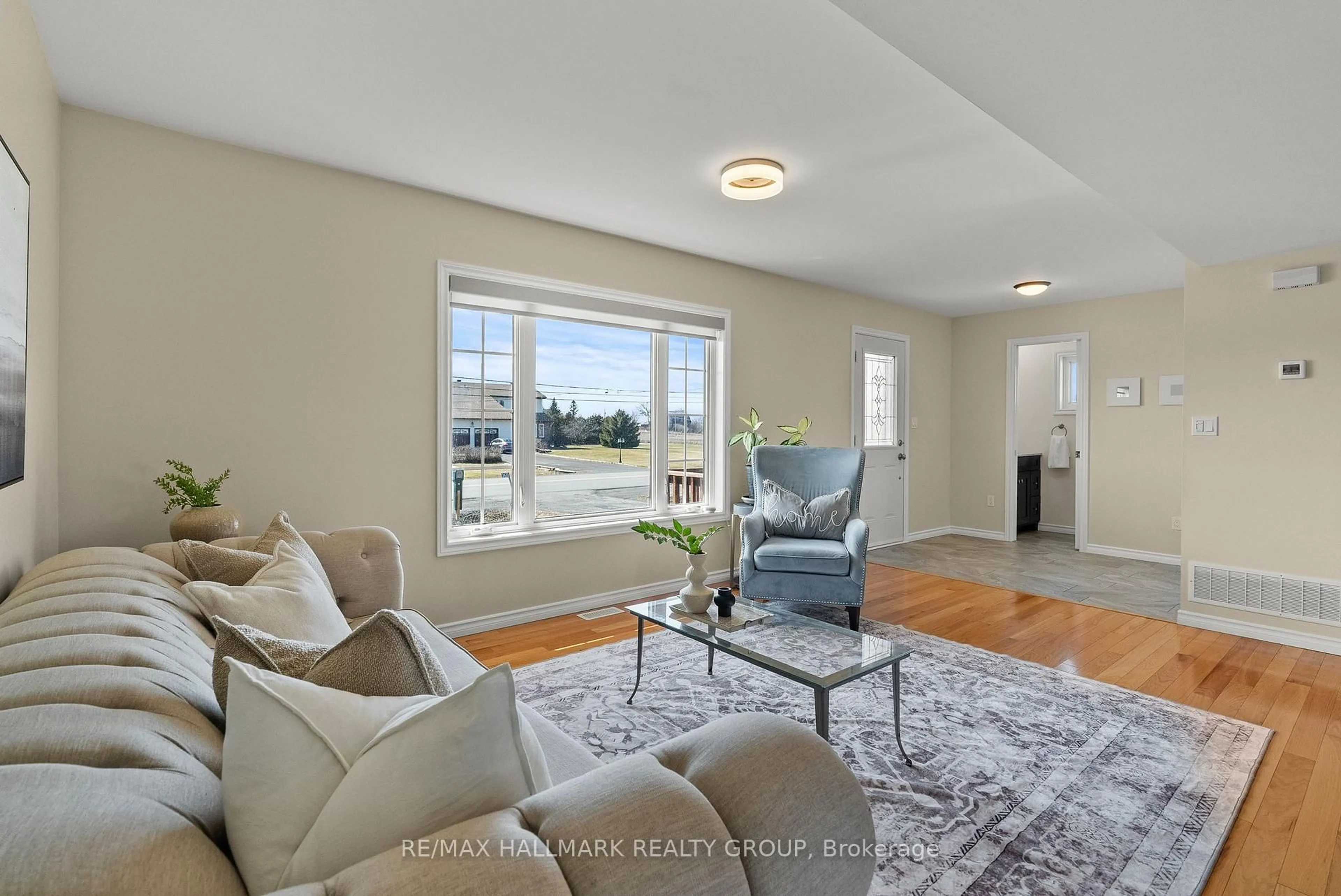 Living room with furniture, unknown for 2431 Dunning Rd, Ottawa Ontario K4C 1L8