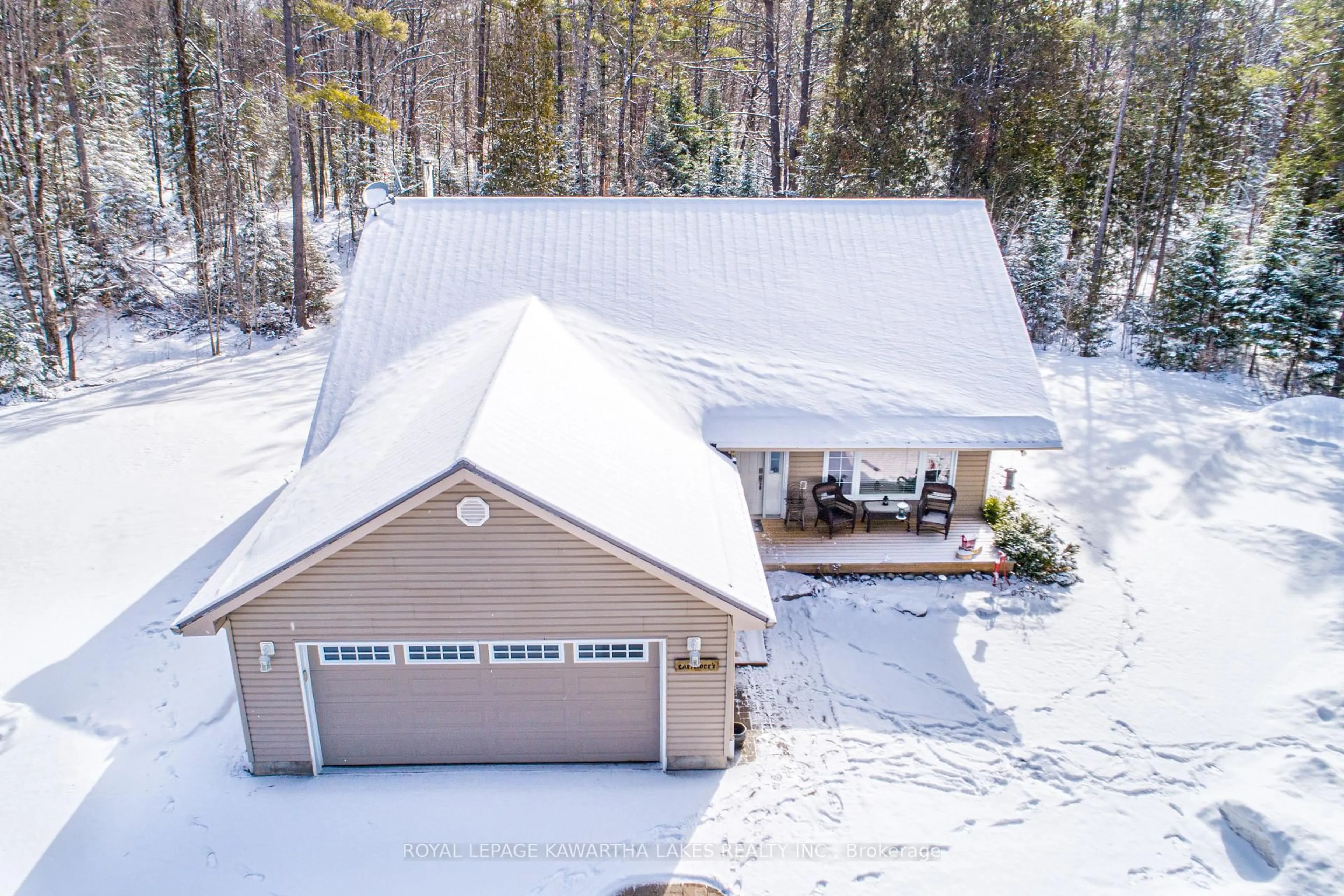 A pic from outside/outdoor area/front of a property/back of a property/a pic from drone, unknown for 914 County Rd 49, Trent Lakes Ontario K0M 1A0