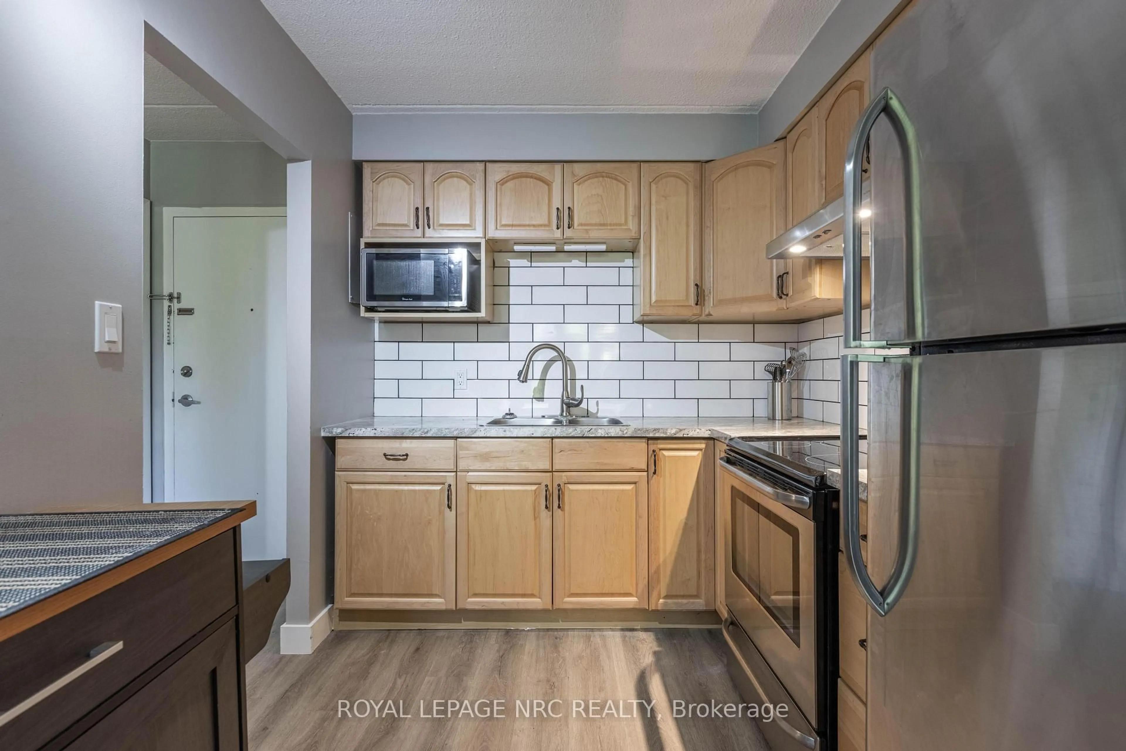 Standard kitchen, ceramic/tile floor for 41 Rykert St #207, St. Catharines Ontario L2S 3A4