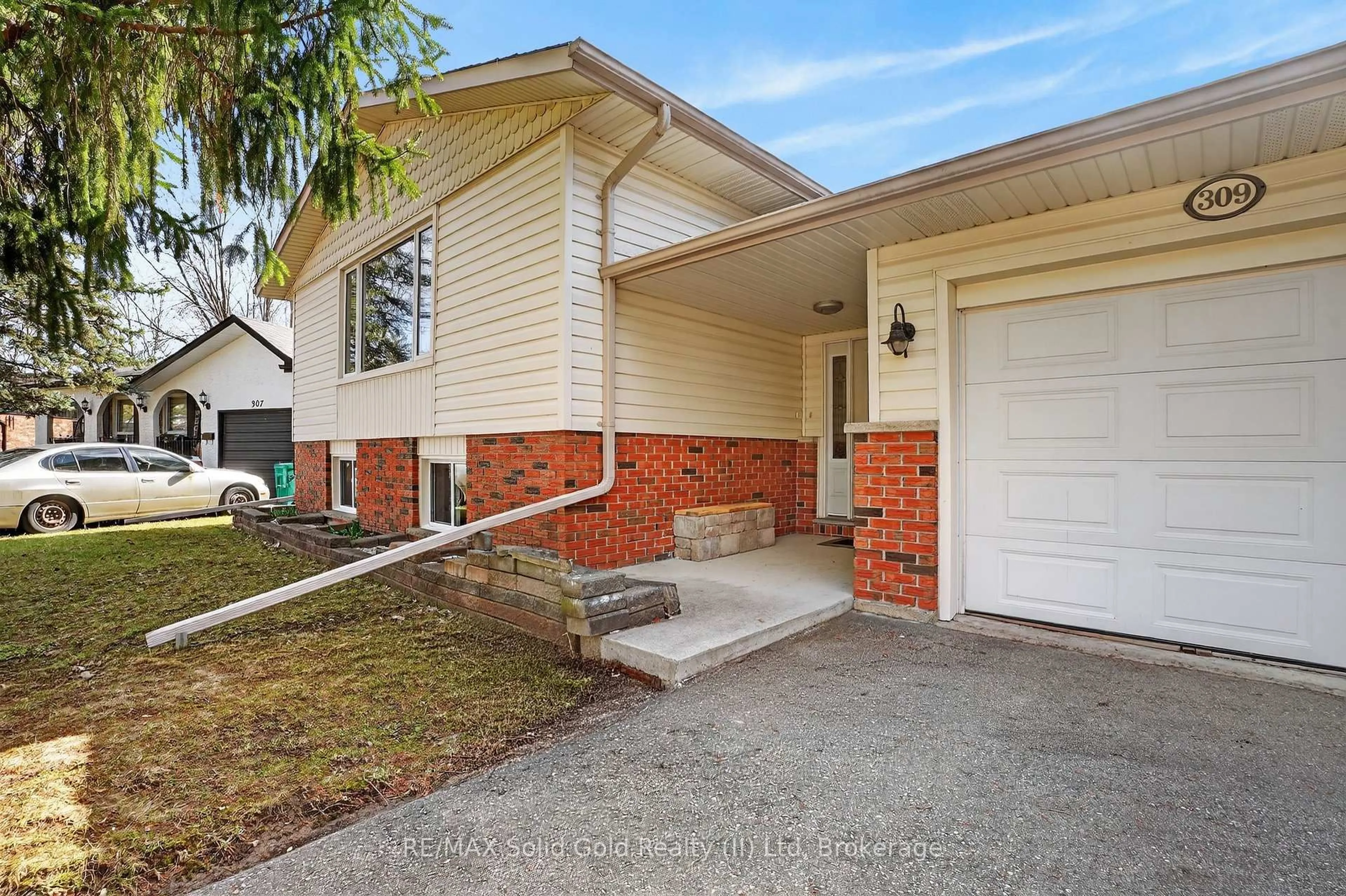 Home with brick exterior material, street for 309 Daleside Pl, Waterloo Ontario N2L 5M4