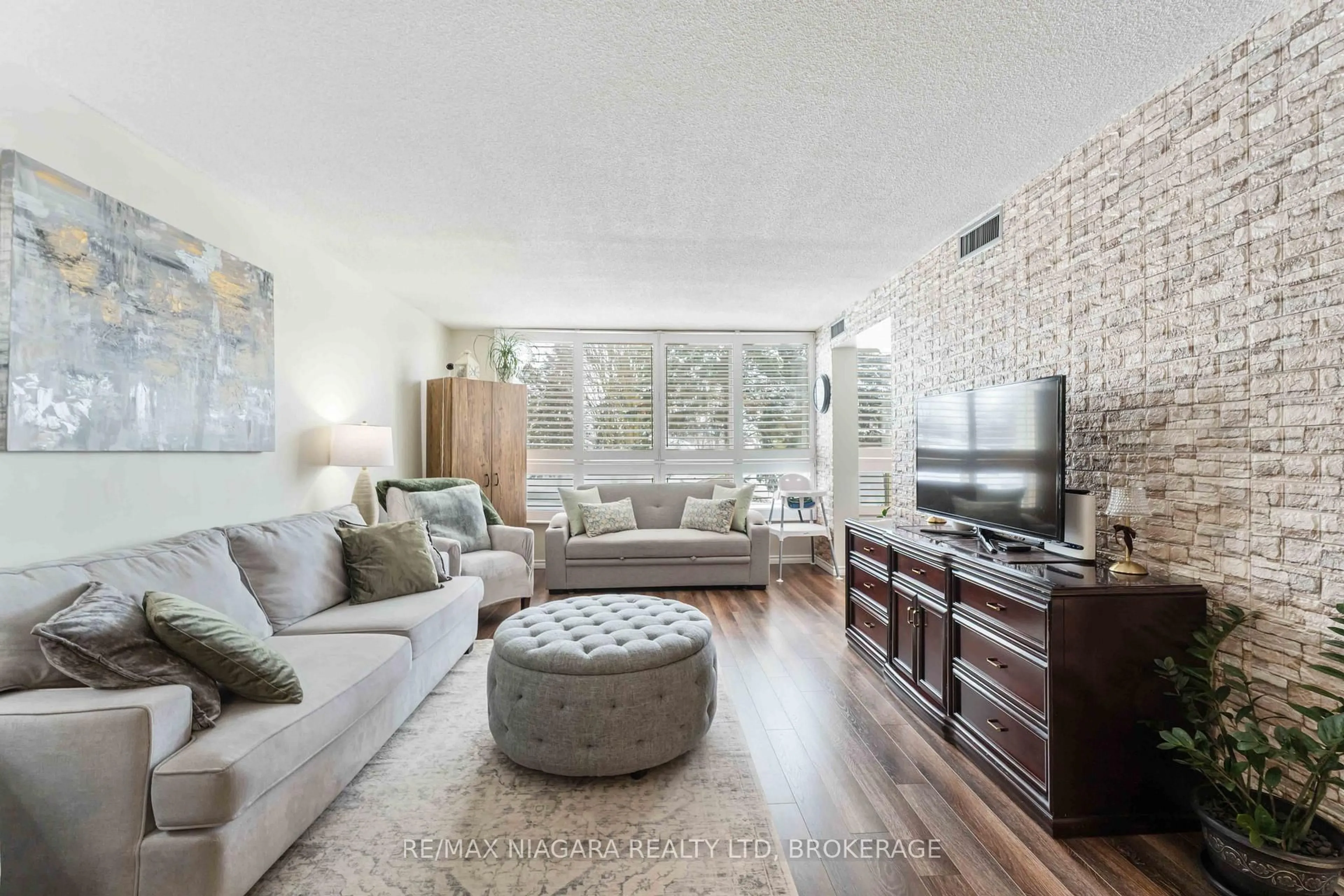 Living room with furniture, unknown for 5100 Dorchester Rd #210, Niagara Falls Ontario L2E 7H4