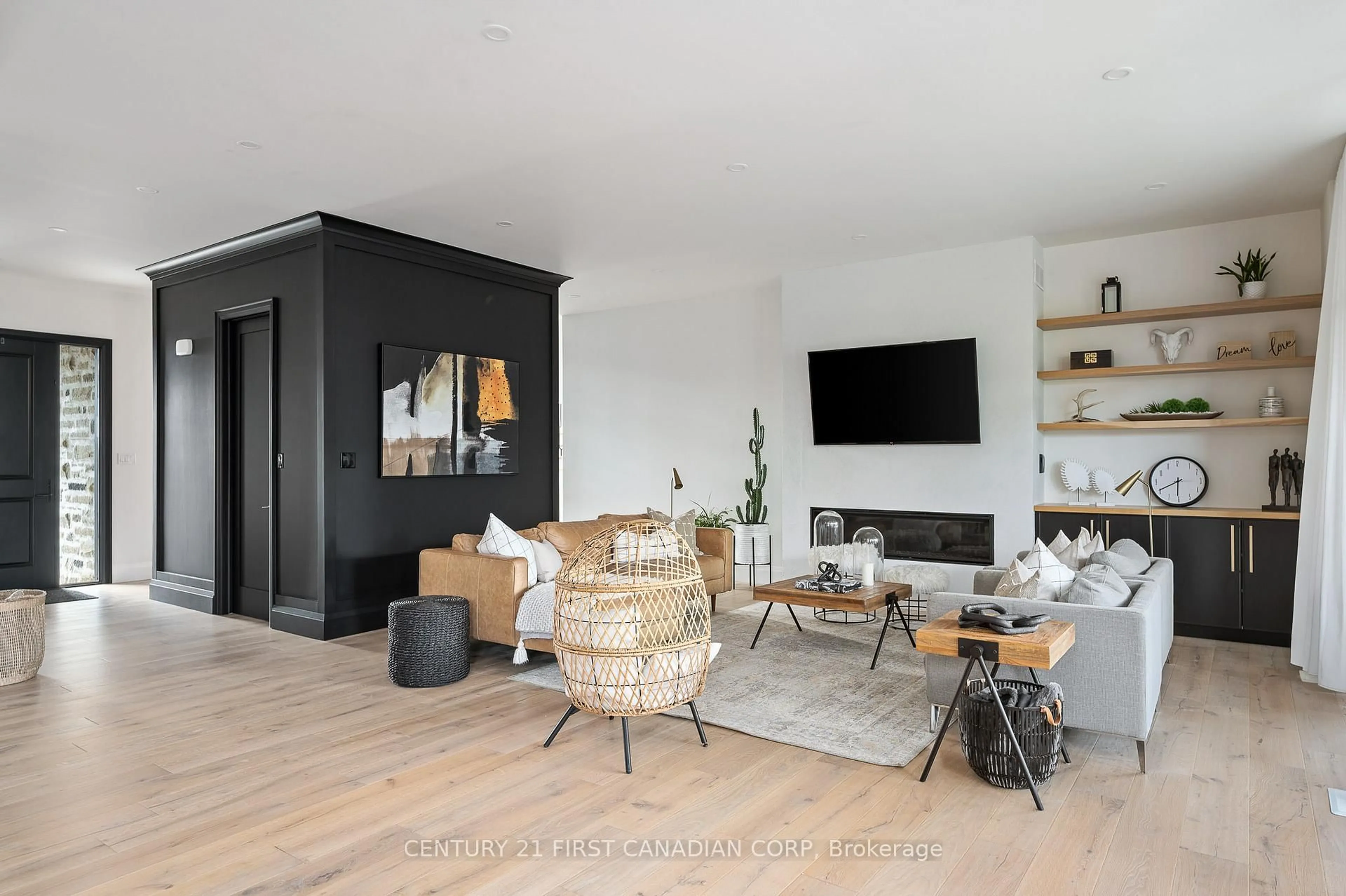 Living room with furniture, wood/laminate floor for 868 White Pine St, London North Ontario N6G 3X9