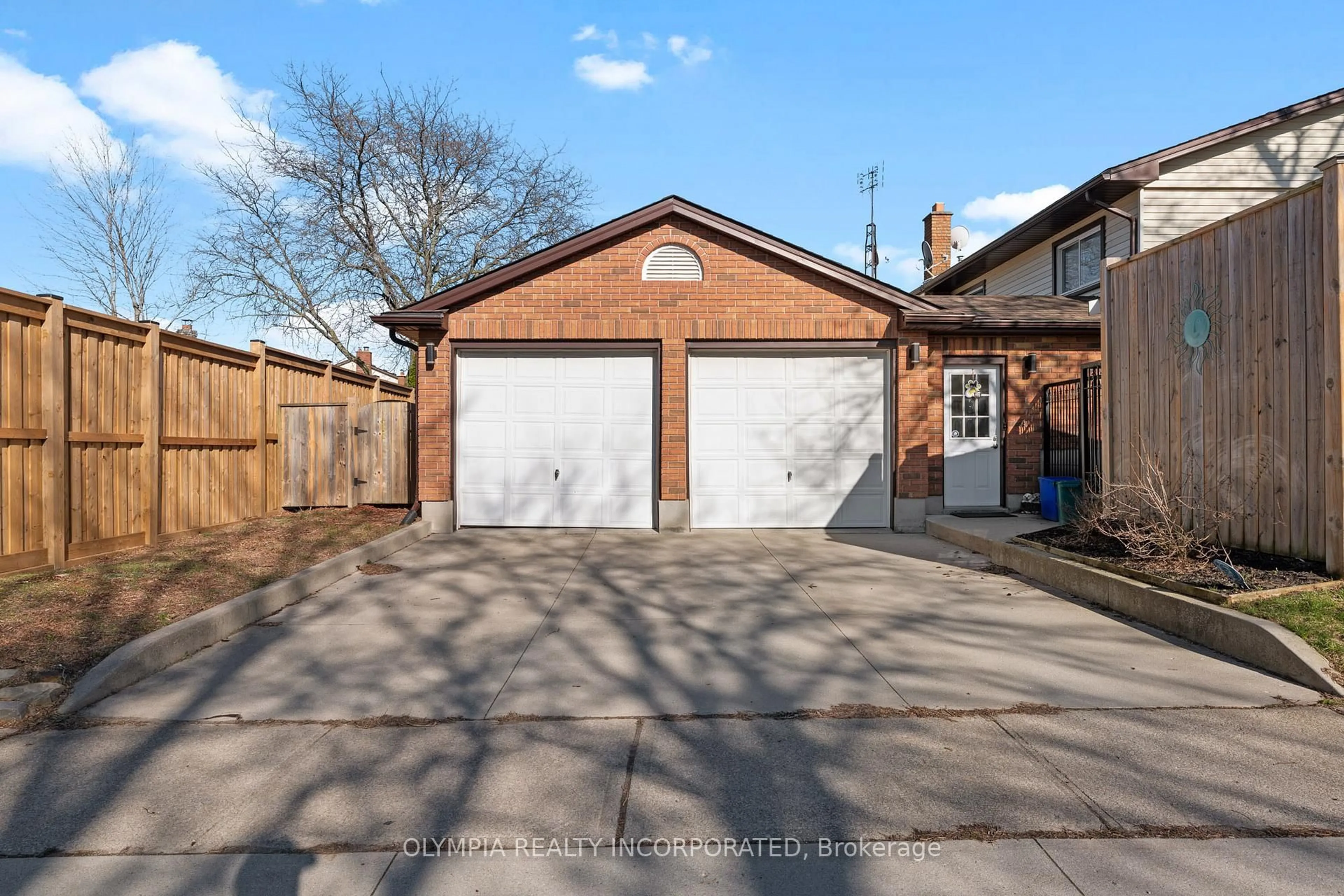 Home with brick exterior material, street for 7451 Green Boughs Rd, Niagara Falls Ontario L2J 3Y8