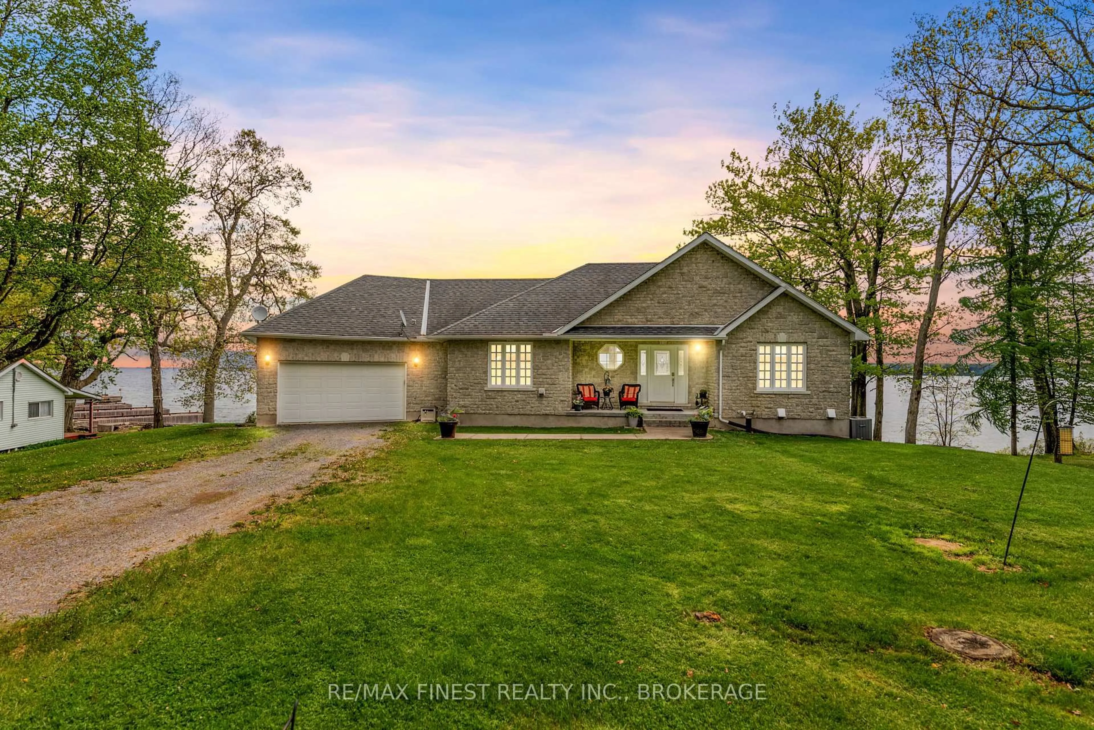A pic from outside/outdoor area/front of a property/back of a property/a pic from drone, water/lake/river/ocean view for 121 Hickory Lane, Wolfe Island Ontario K0H 2Y0