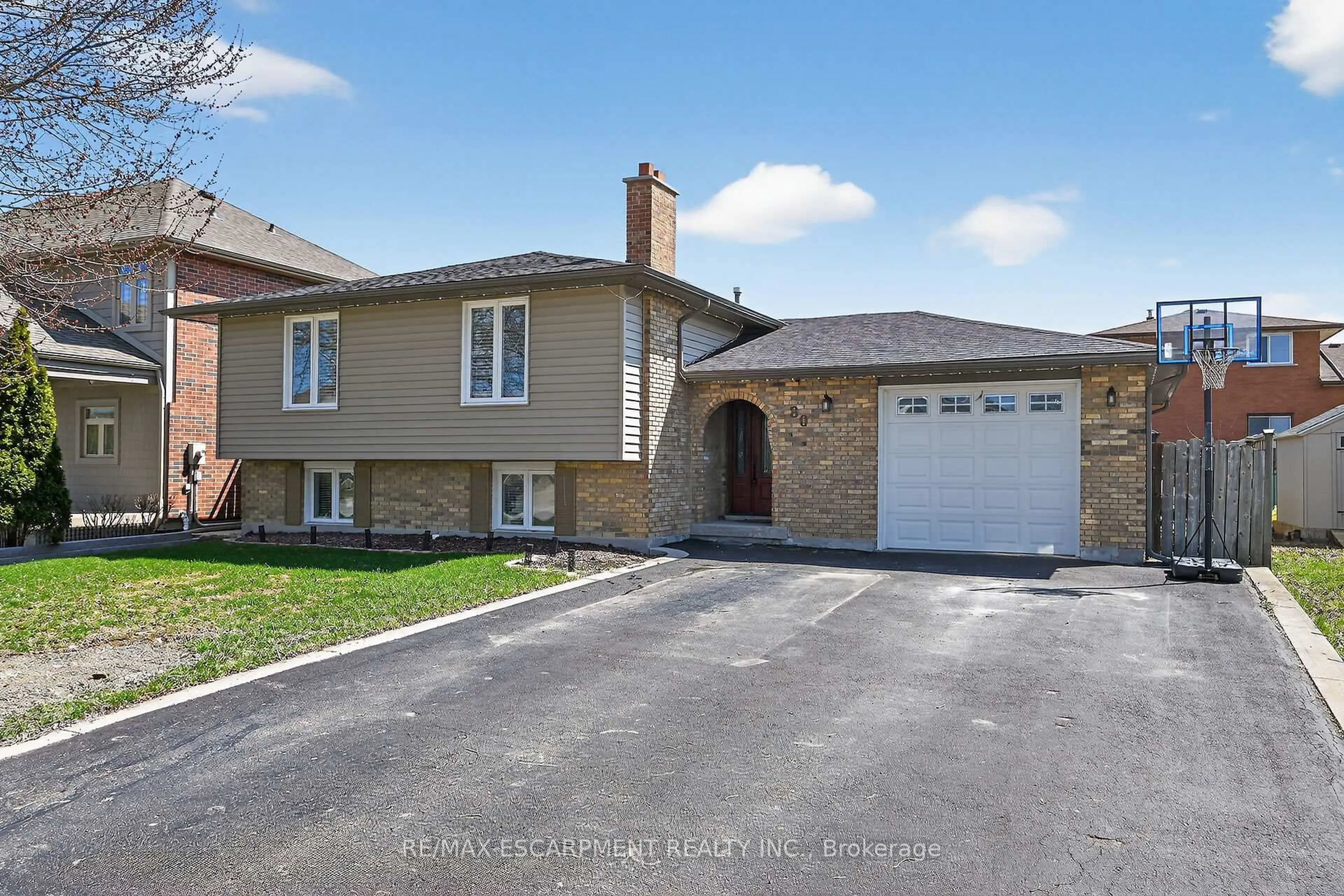 Home with brick exterior material, street for 80 First Rd, Hamilton Ontario L8J 2S9