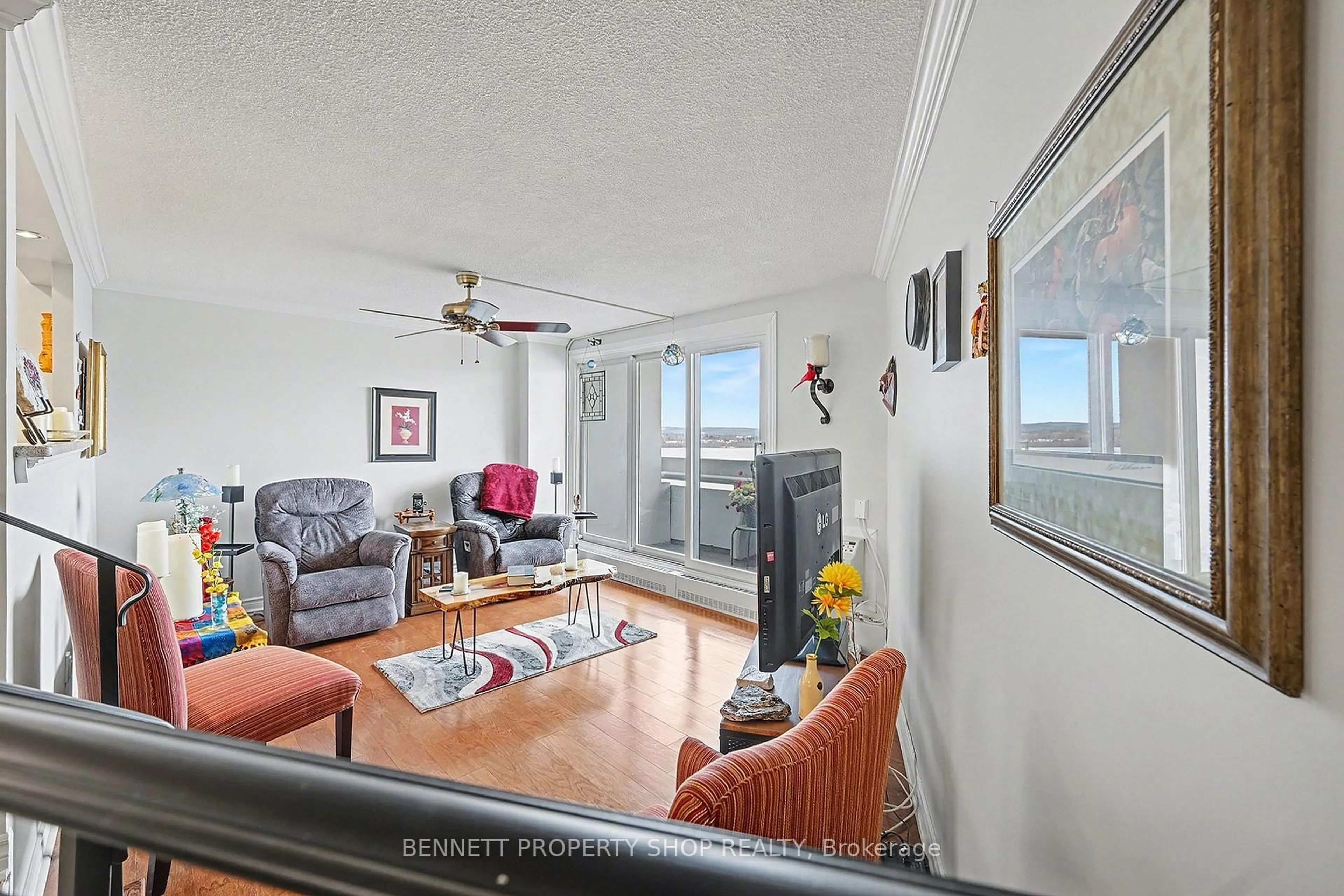 Living room with furniture, unknown for 1081 Ambleside Dr #1201, Ottawa Ontario K2B 8C8