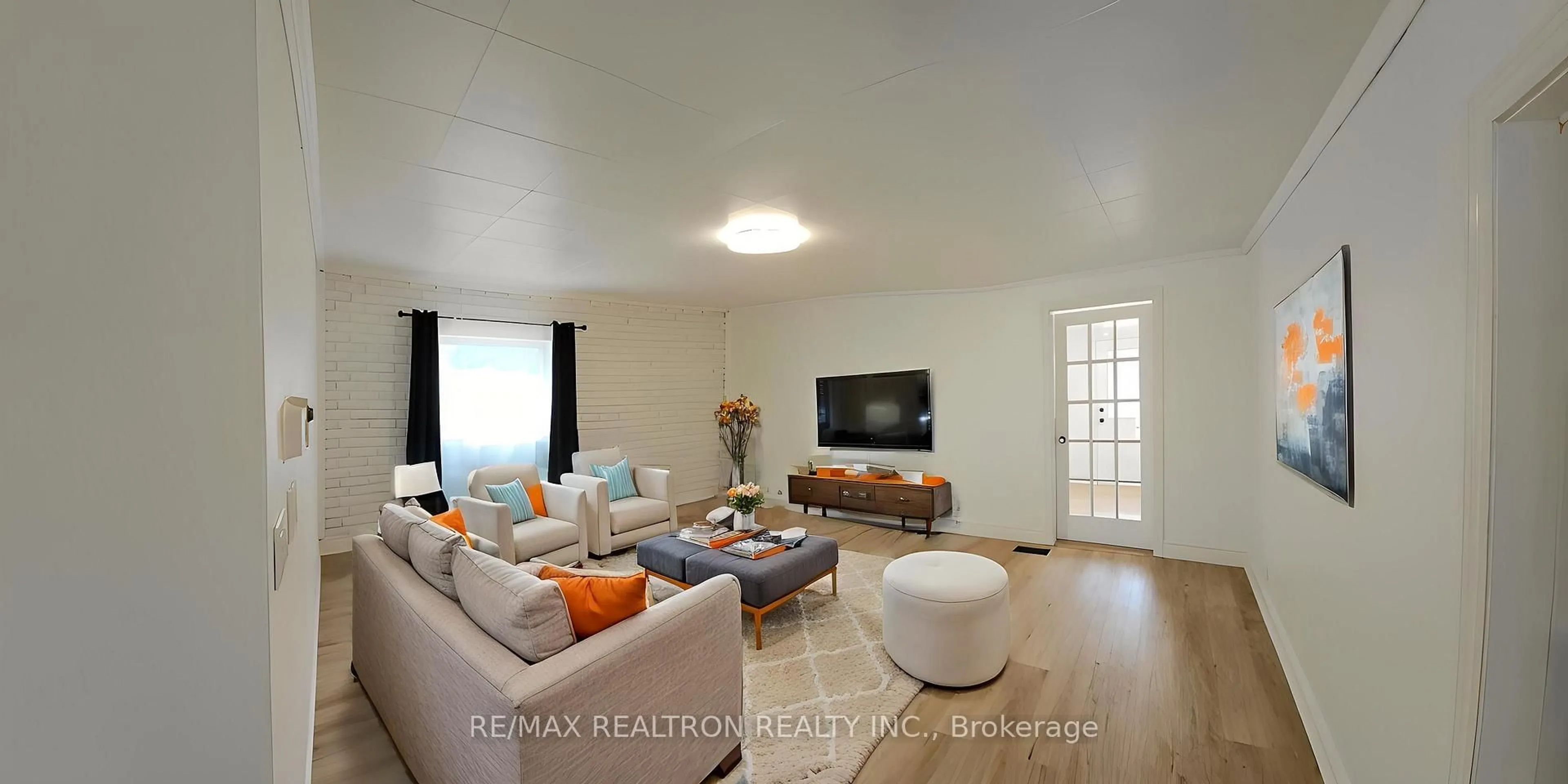 Living room with furniture, wood/laminate floor for 23 Ella St, Chatham-Kent Ontario N0P 2L0