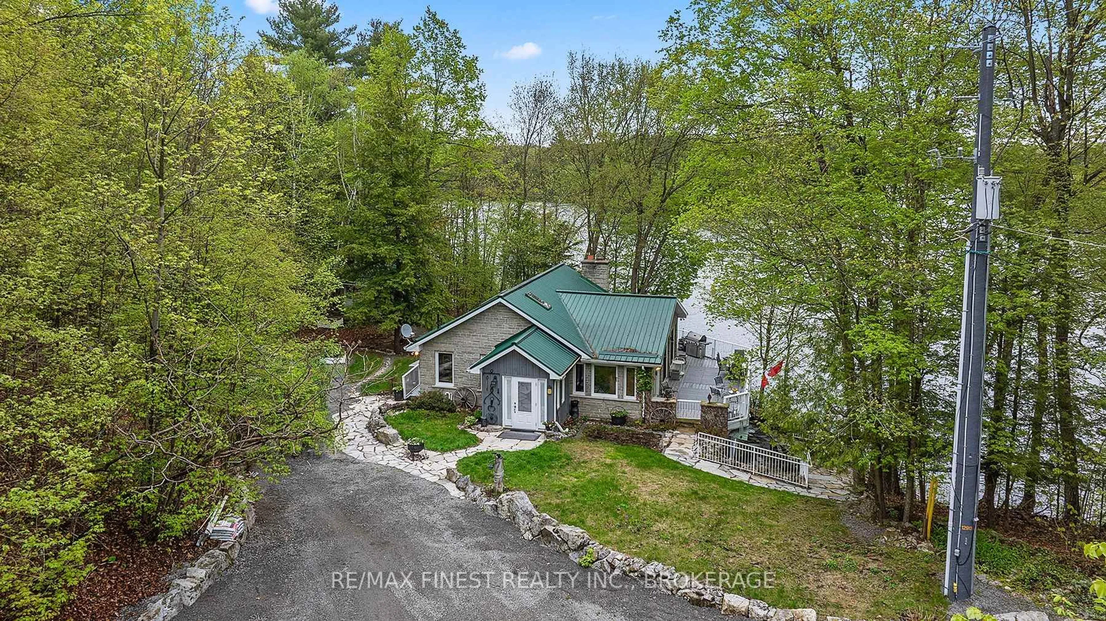A pic from outside/outdoor area/front of a property/back of a property/a pic from drone, water/lake/river/ocean view for 8126 Perth Rd, Perth Road Ontario K0H 2L0