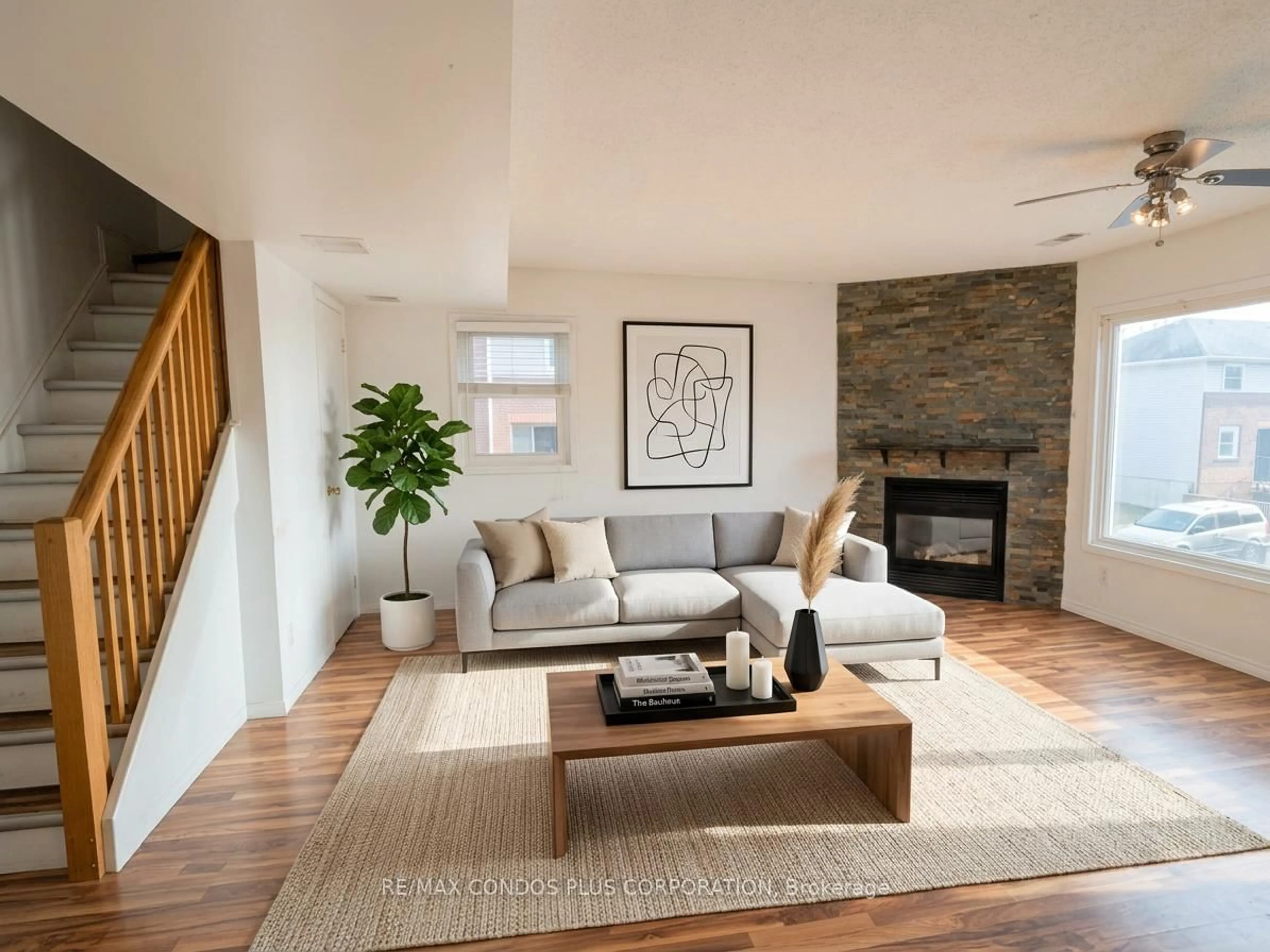 Living room with furniture, wood/laminate floor for 461 Beechwood Pl #51, Waterloo Ontario N2T 2N8