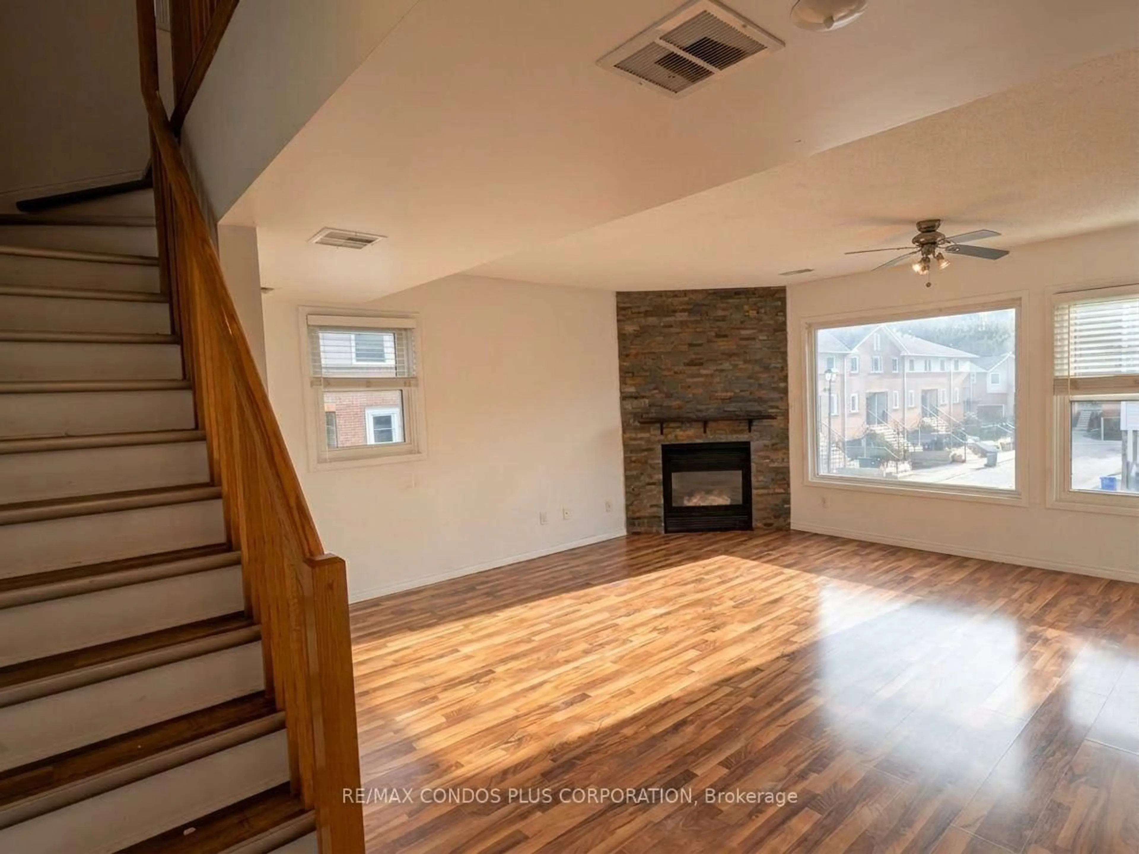 Living room with furniture, wood/laminate floor for 461 Beechwood Pl #51, Waterloo Ontario N2T 2N8