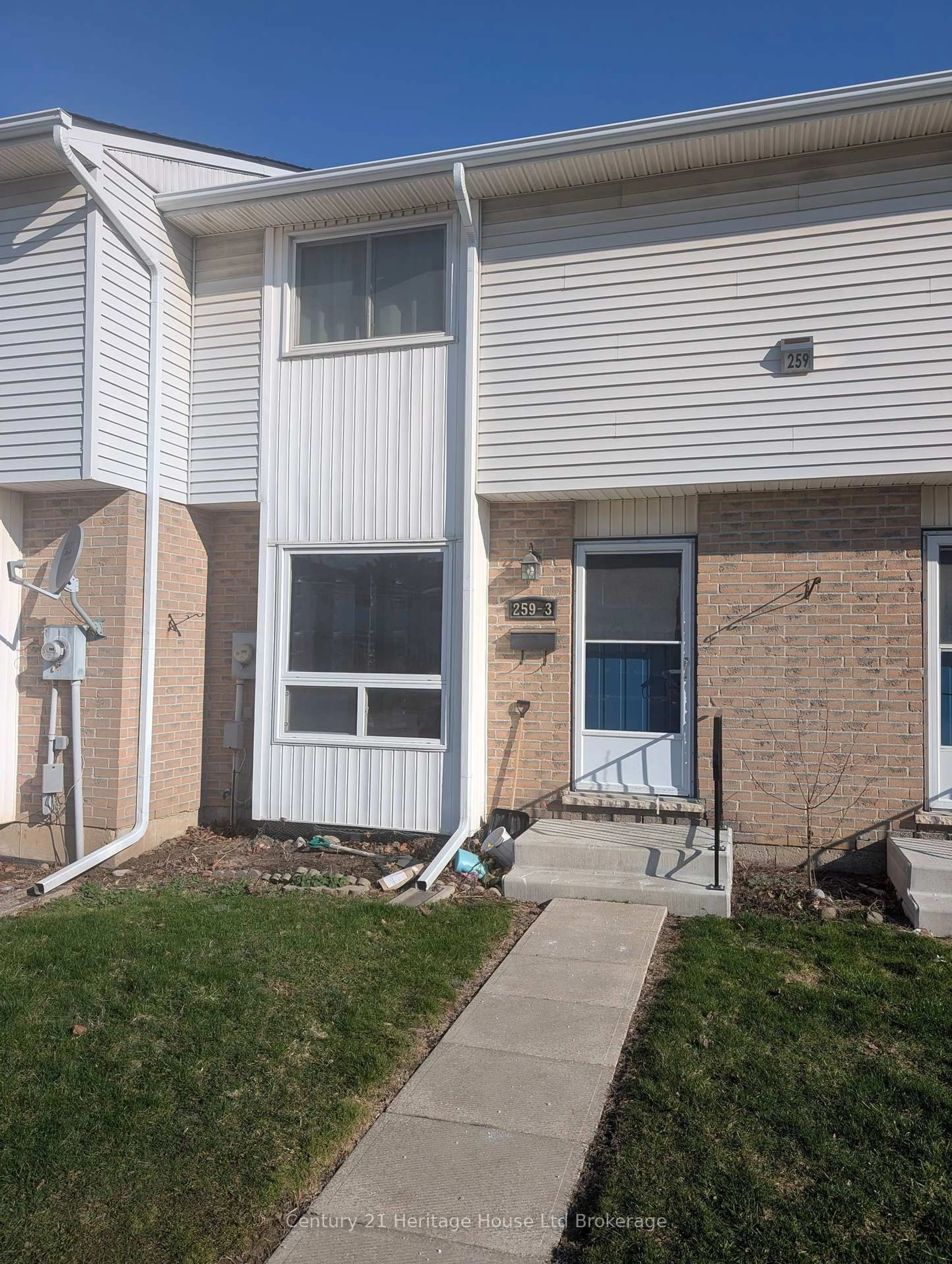 Home with vinyl exterior material, street for 259 Lansdowne Ave #3, Woodstock Ontario N4T 1N6