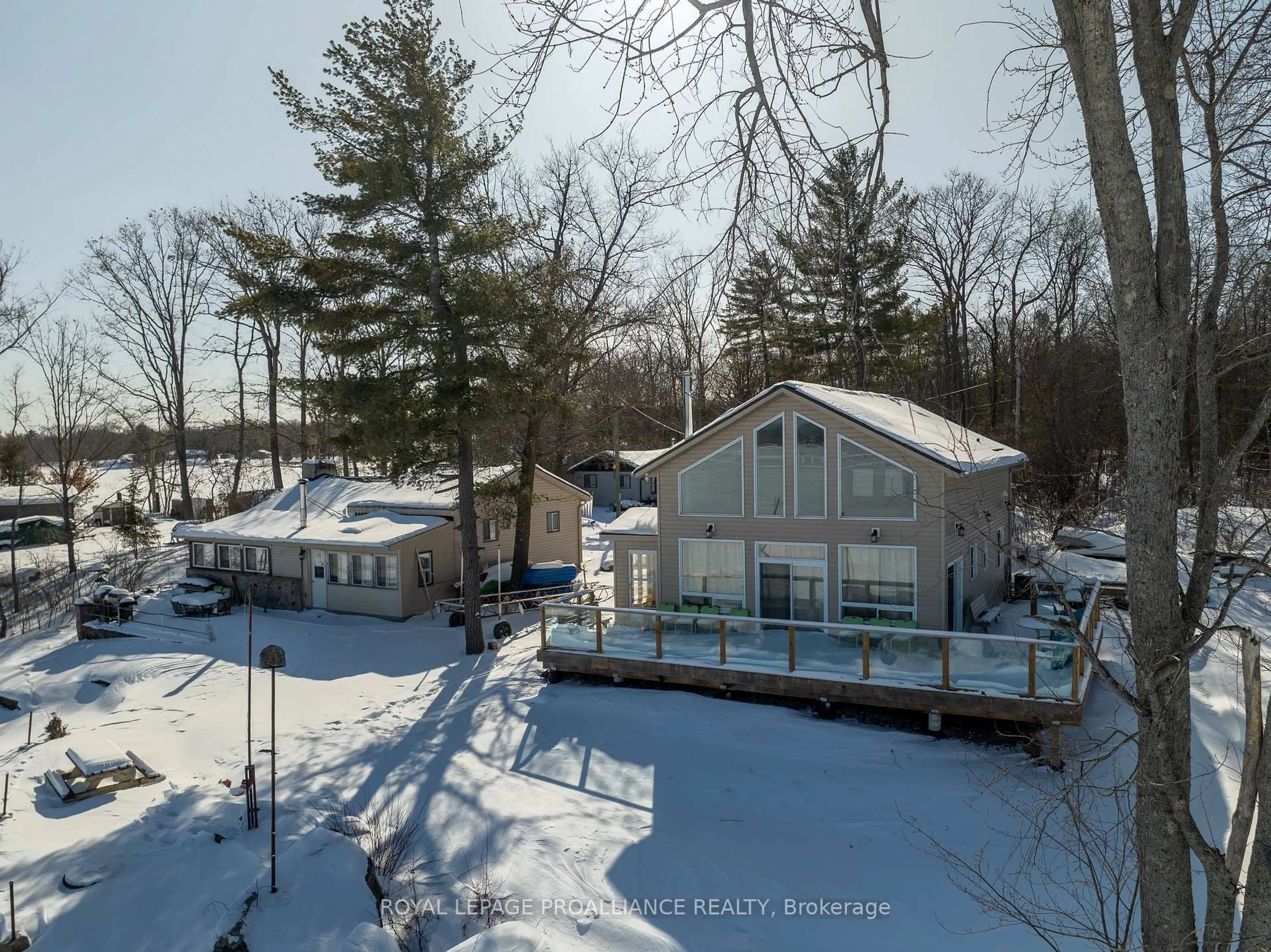 A pic from outside/outdoor area/front of a property/back of a property/a pic from drone, water/lake/river/ocean view for 75 Houston Lane, Tweed Ontario K0K 3J0