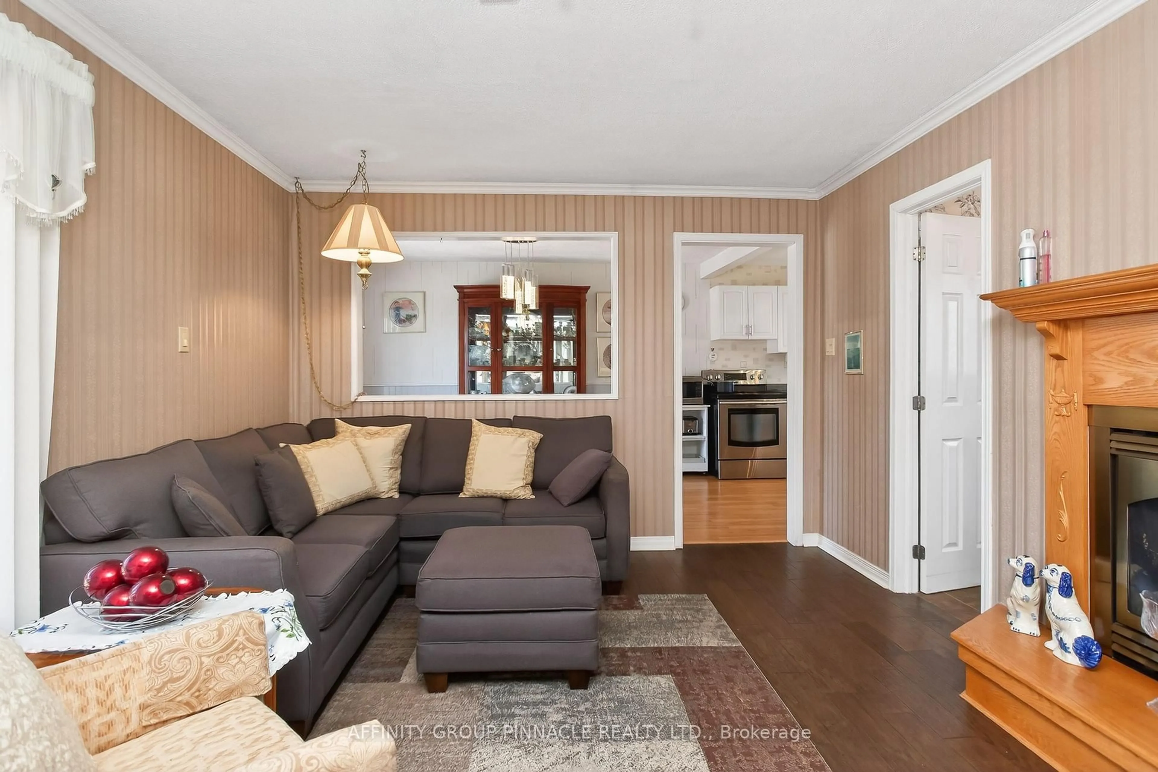 Living room with furniture, wood/laminate floor for 272 Crosby Dr, Kawartha Lakes Ontario K0M 1A0