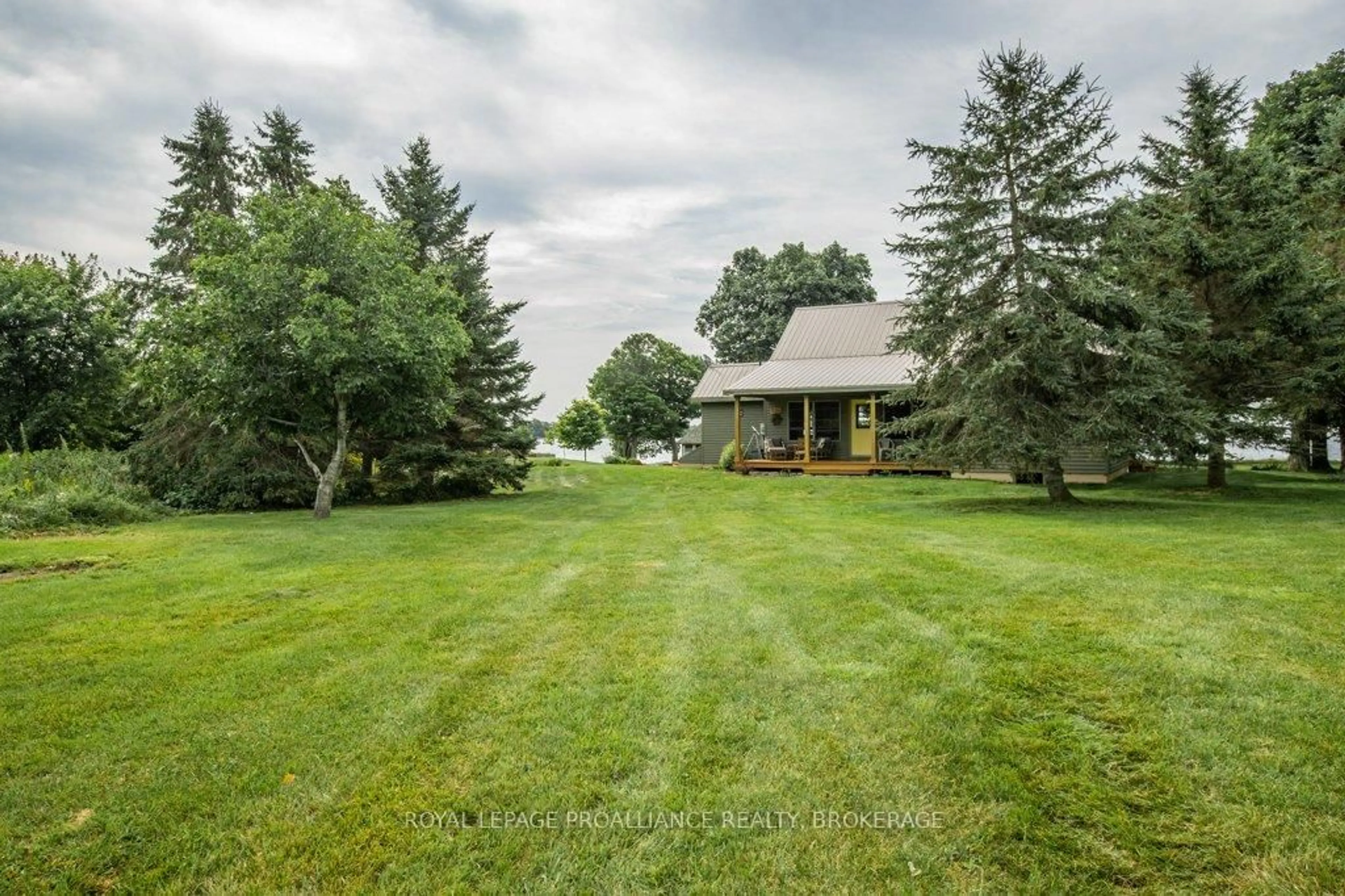 A pic from outside/outdoor area/front of a property/back of a property/a pic from drone, unknown for 395 Nine Mile Point Rd, Wolfe Island Ontario K0H 2Y0