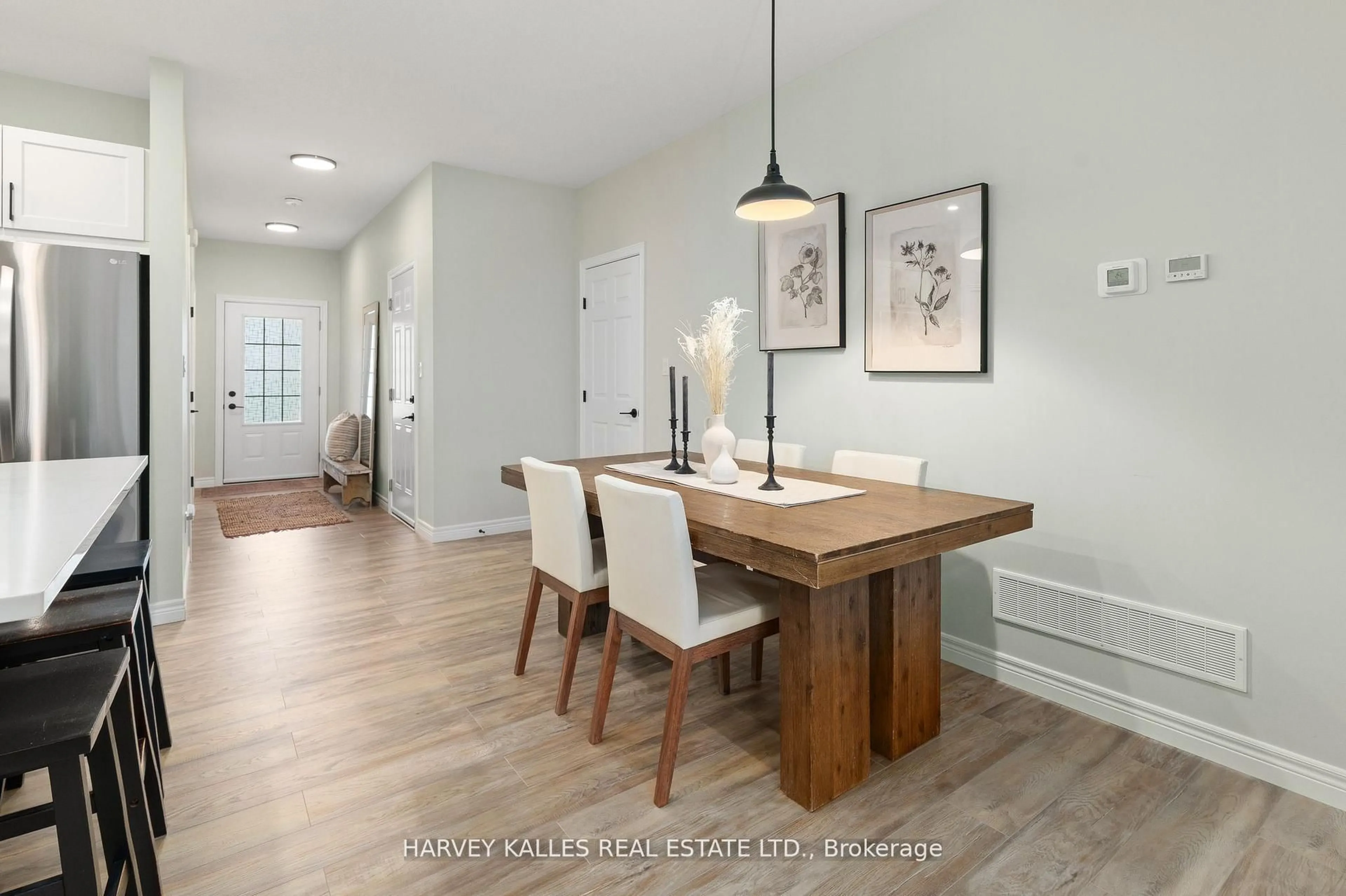 Dining room, wood/laminate floor for 16 Dayton Crt, Prince Edward County Ontario K0K 2T0