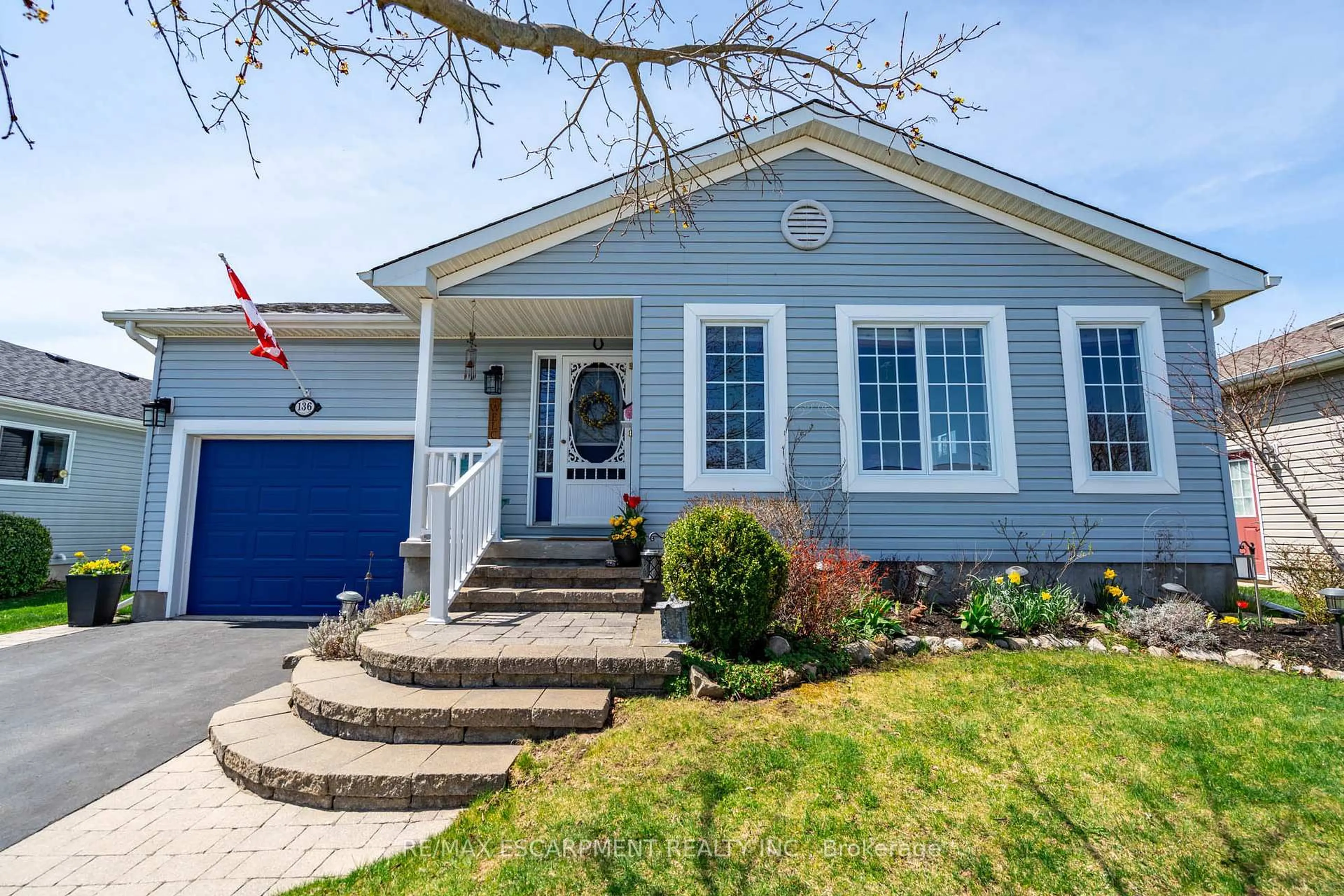 Home with vinyl exterior material, street for 136 Glenariff Dr, Hamilton Ontario L8B 1A5