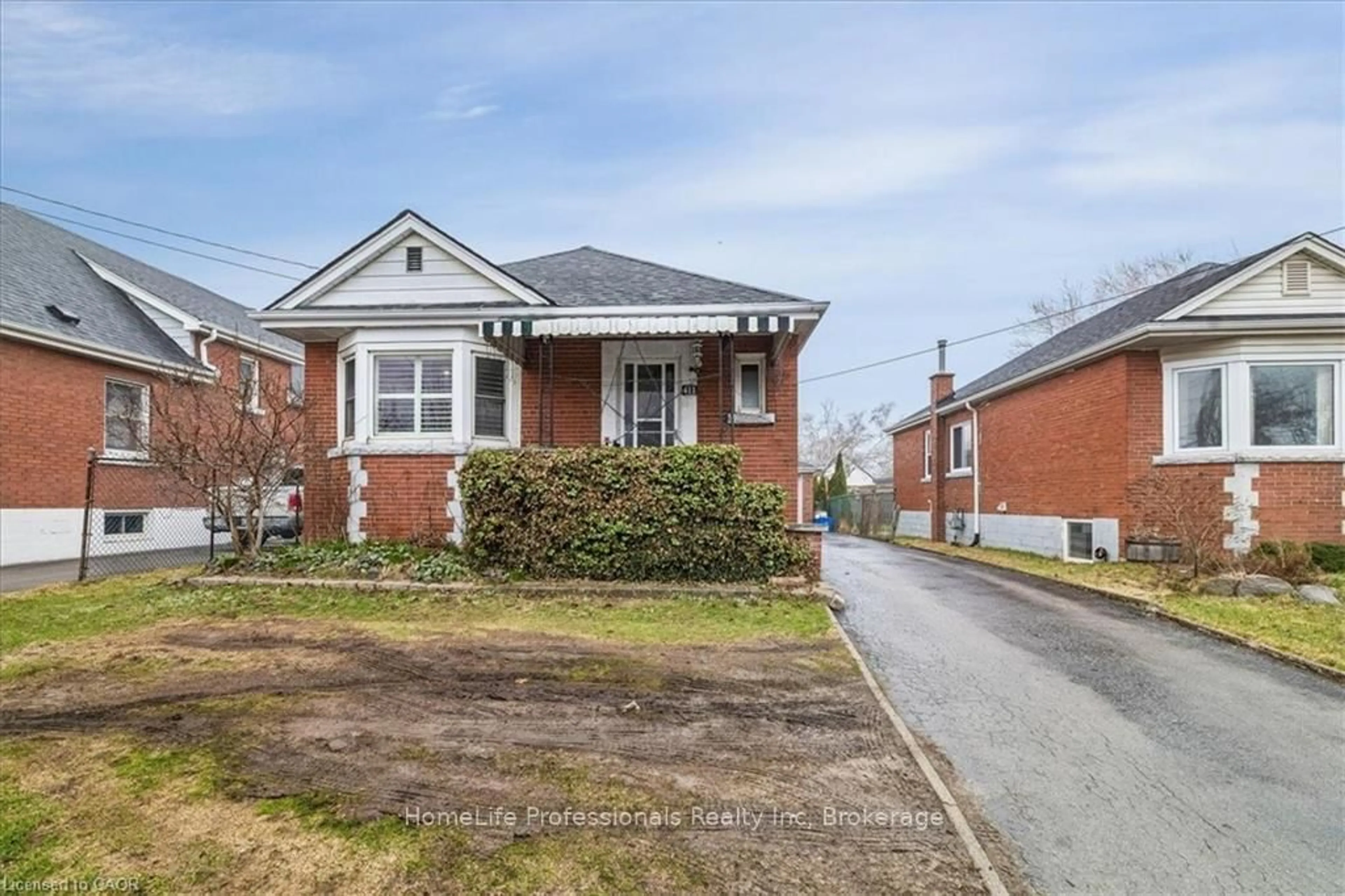 Home with brick exterior material, street for 411 UPPER GAGE Ave, Hamilton Ontario L8V 4H8