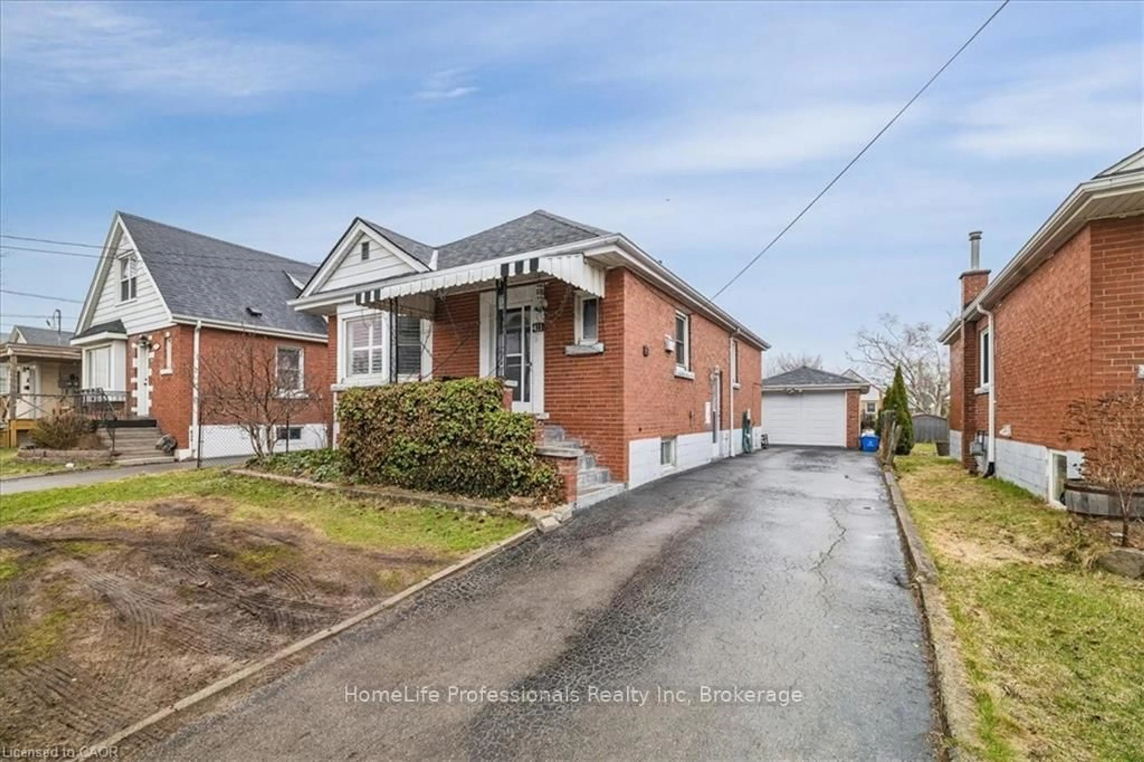 Home with brick exterior material, street for 411 UPPER GAGE Ave, Hamilton Ontario L8V 4H8
