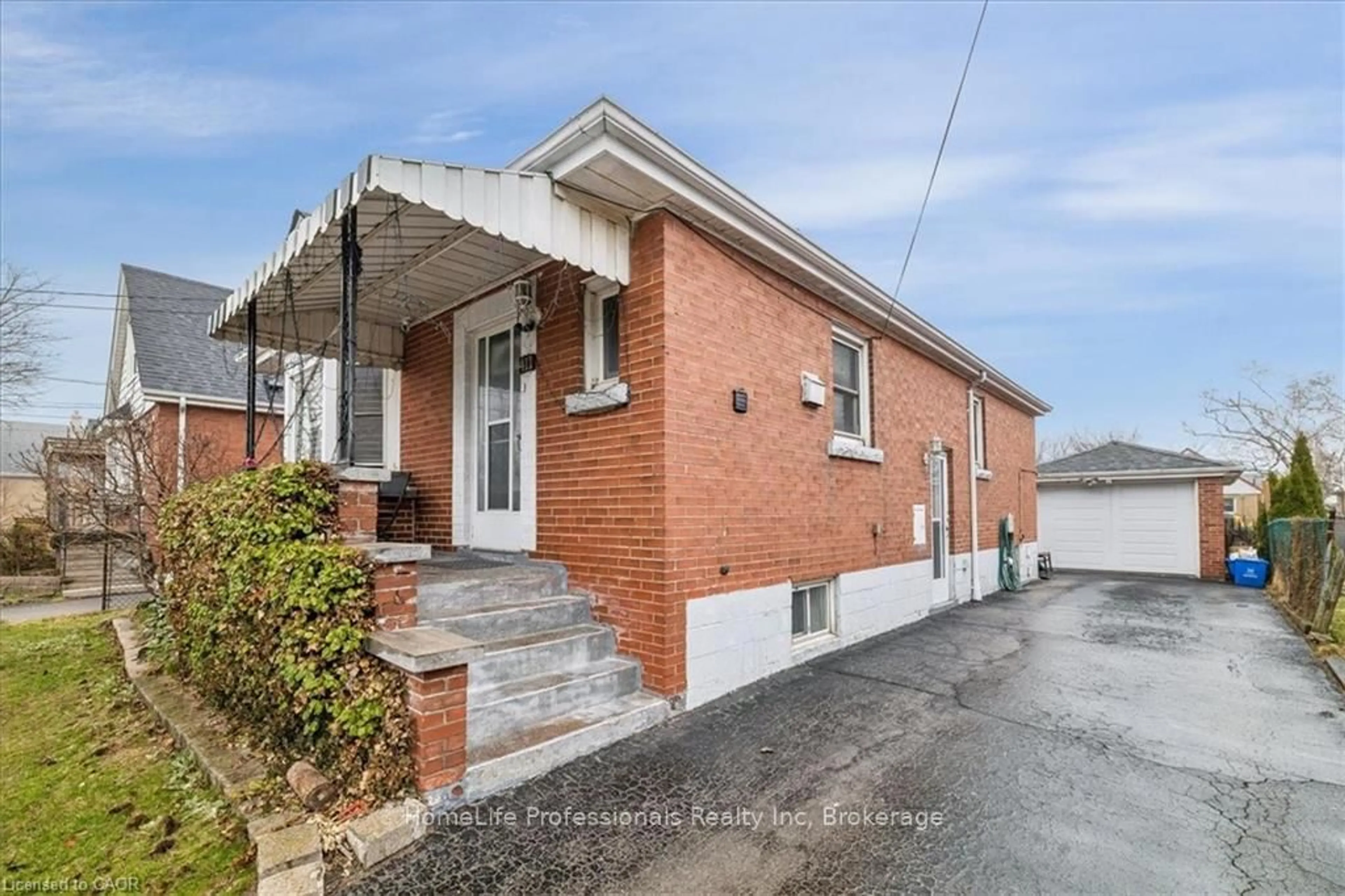 Home with brick exterior material, street for 411 UPPER GAGE Ave, Hamilton Ontario L8V 4H8